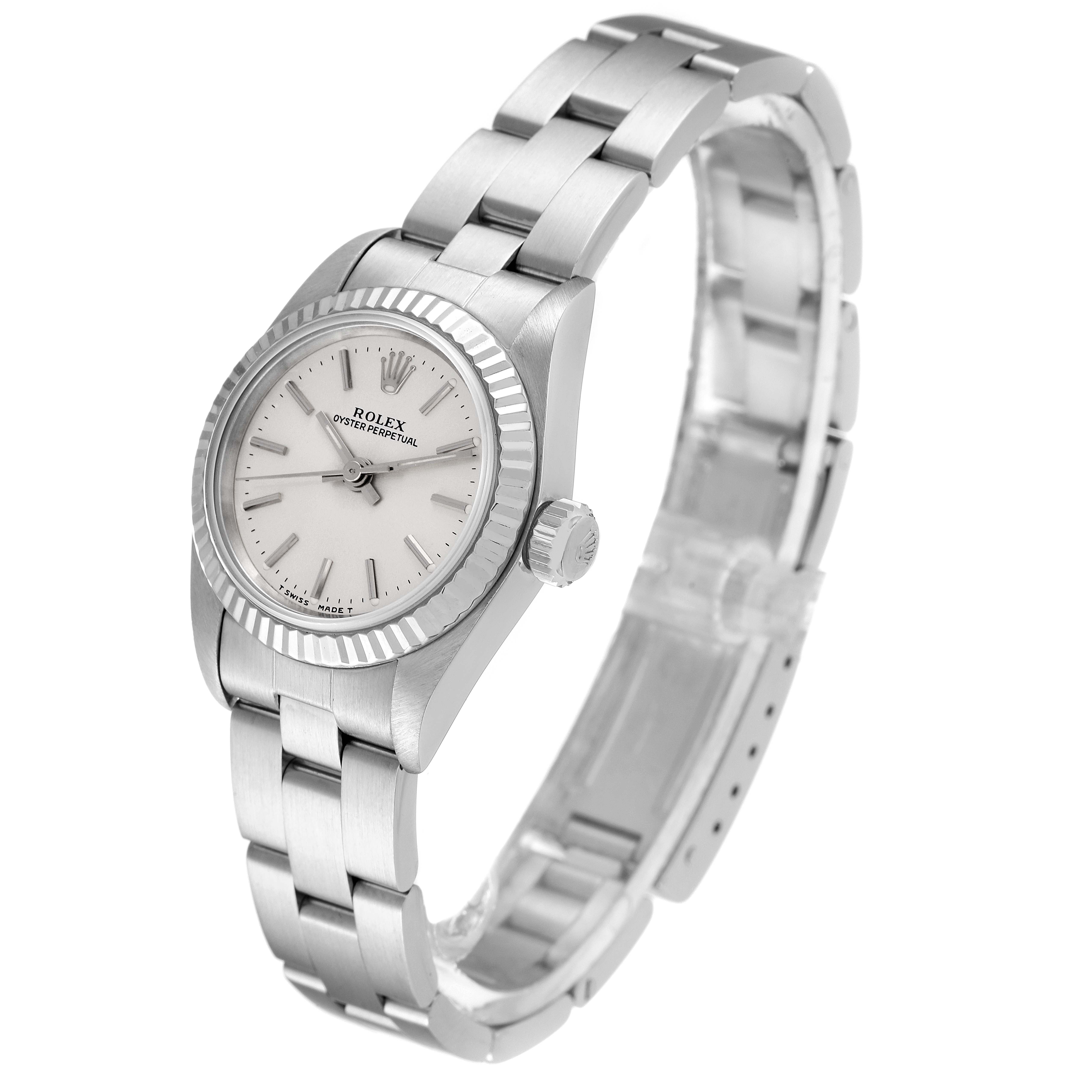 The Rolex Datejust 67194 Women
s Stainless Steel Silver Dial 67194 Women
s Stainless Steel Silver Dial watch is shown at an angle highlighting the face, bezel, crown, and part of the bracelet.
