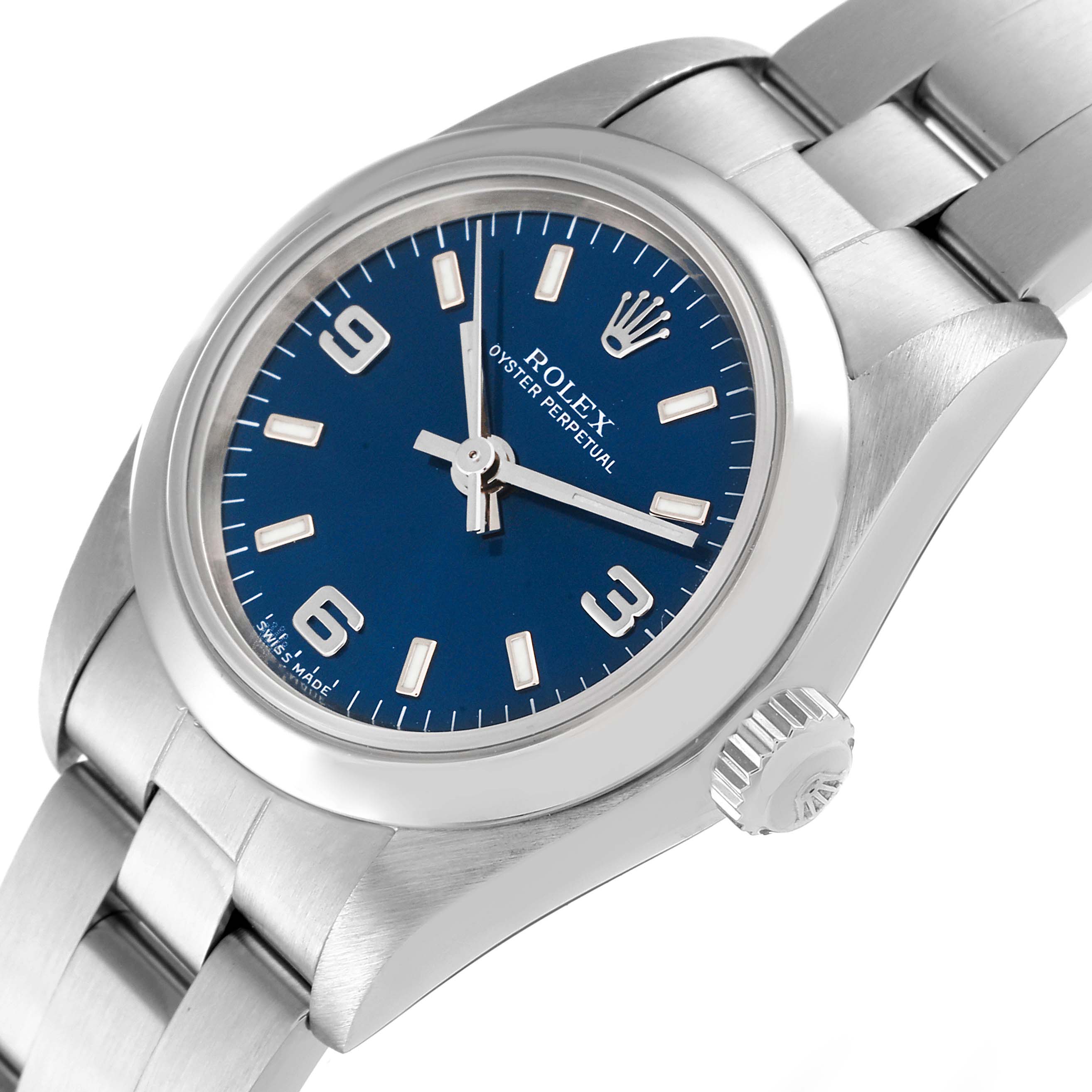 This image shows a side and partial frontal view of a Rolex Oyster Perpetual 76080 Women's Stainless Steel Blue Dial 76080 Women's Stainless Steel Blue Dial watch, highlighting its blue dial, crown, and metal bracelet.