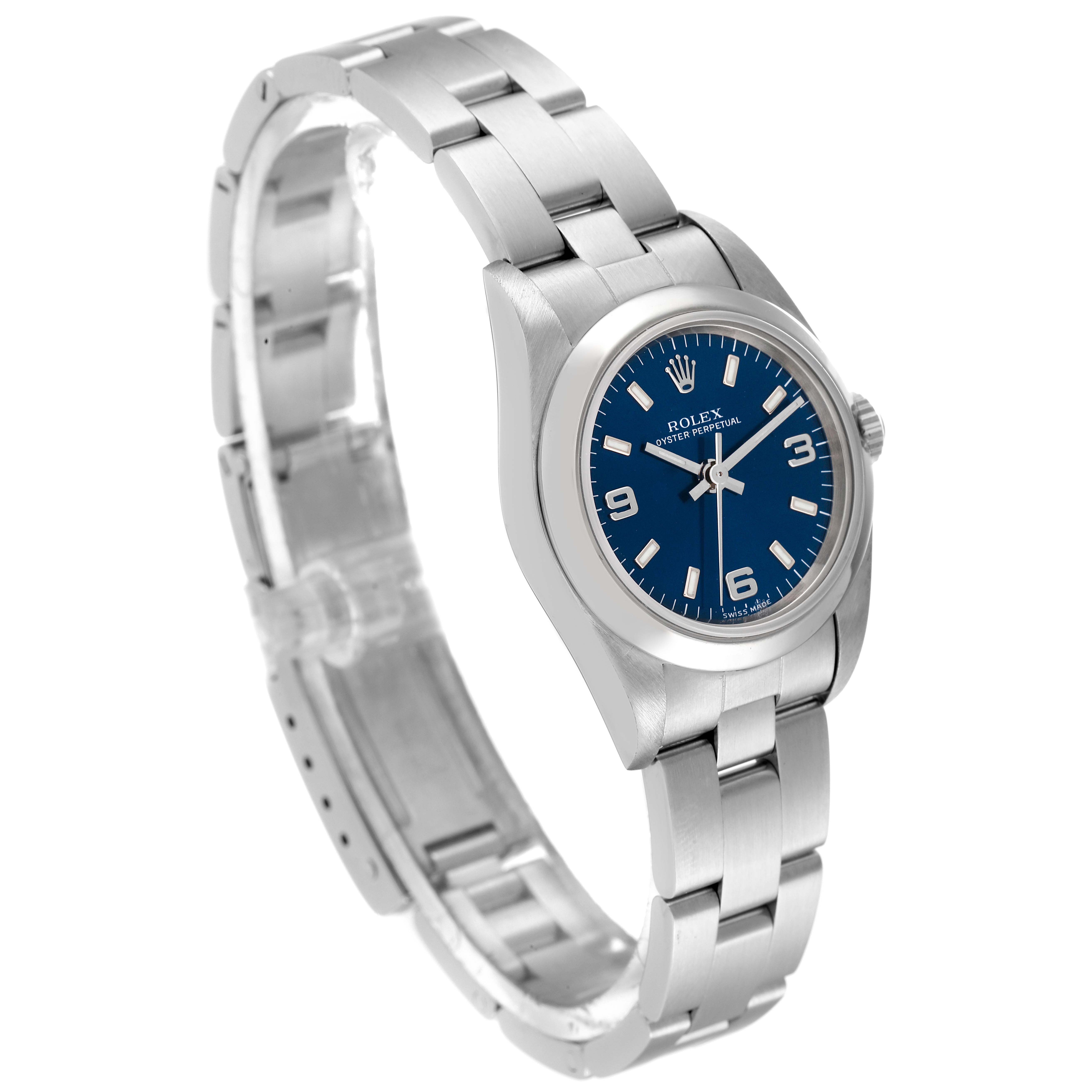 This image shows a Rolex Oyster Perpetual 76080 Women's Stainless Steel Blue Dial 76080 Women's Stainless Steel Blue Dial watch at an angled view, displaying the blue dial, bezel, and linked metal bracelet.