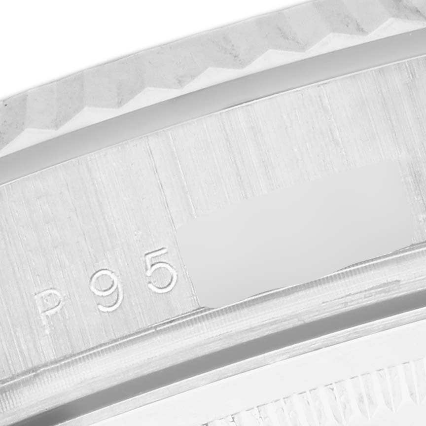 This close-up image shows the bezel and case side of a Rolex President 118239 Men's White Gold Pink Dial 118239 Men's White Gold Pink Dial model watch.