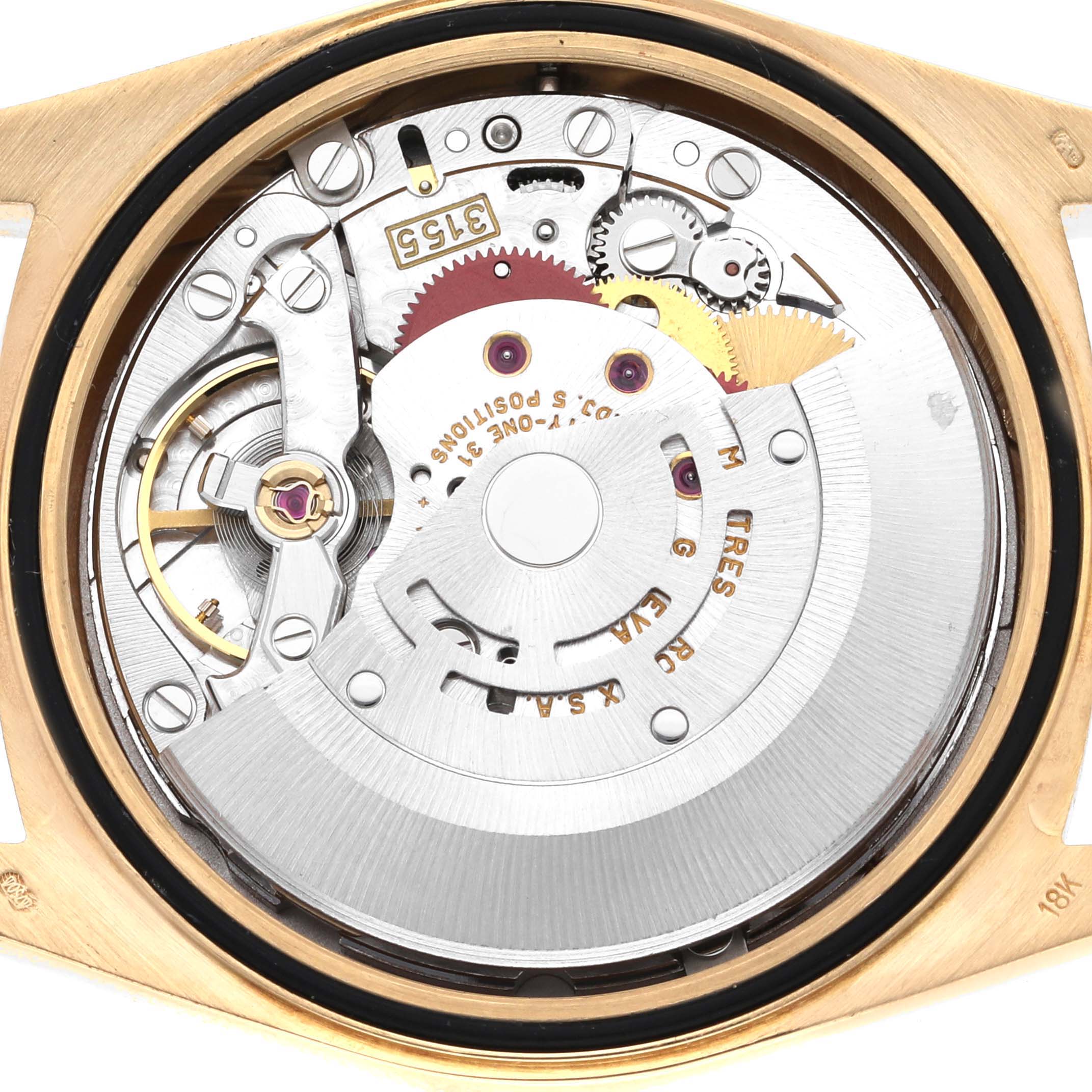 This image shows the internal mechanism and movement of a Rolex President 18238 Men's Yellow Gold Champagne Dial 18238 Men's Yellow Gold Champagne Dial watch viewed from the back.
