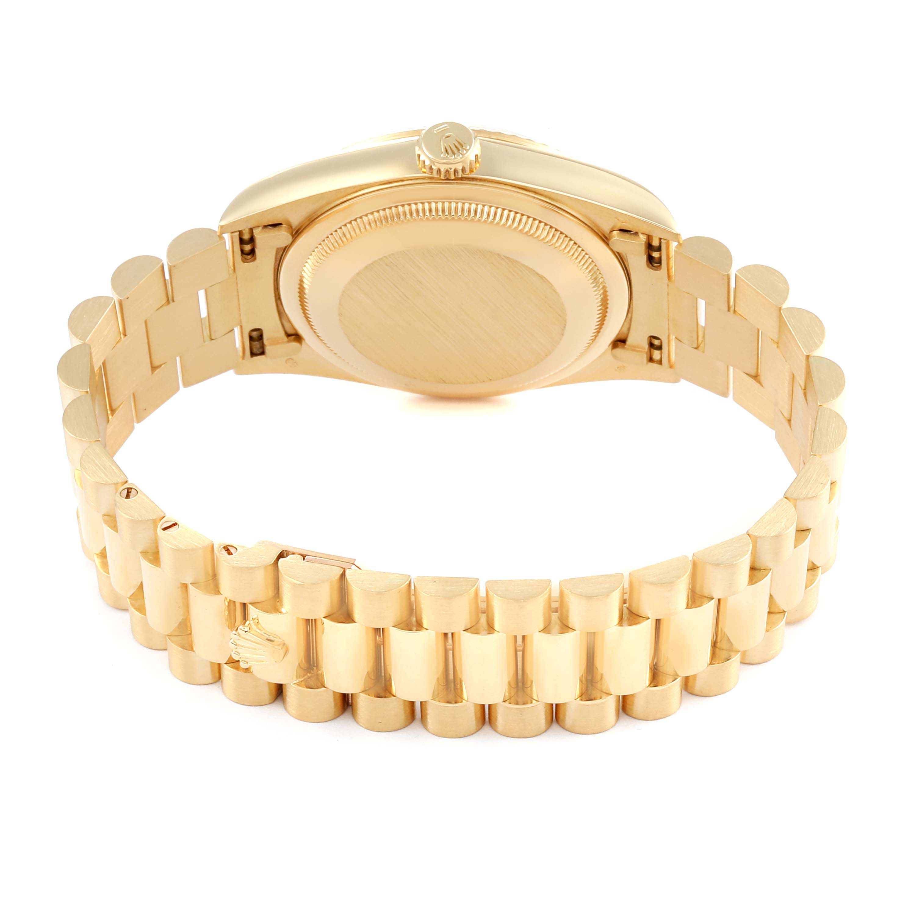 This Rolex President 18238 Men's Yellow Gold Champagne Dial 18238 Men's Yellow Gold Champagne Dial model wristwatch is shown from the back, featuring the case back and President bracelet.