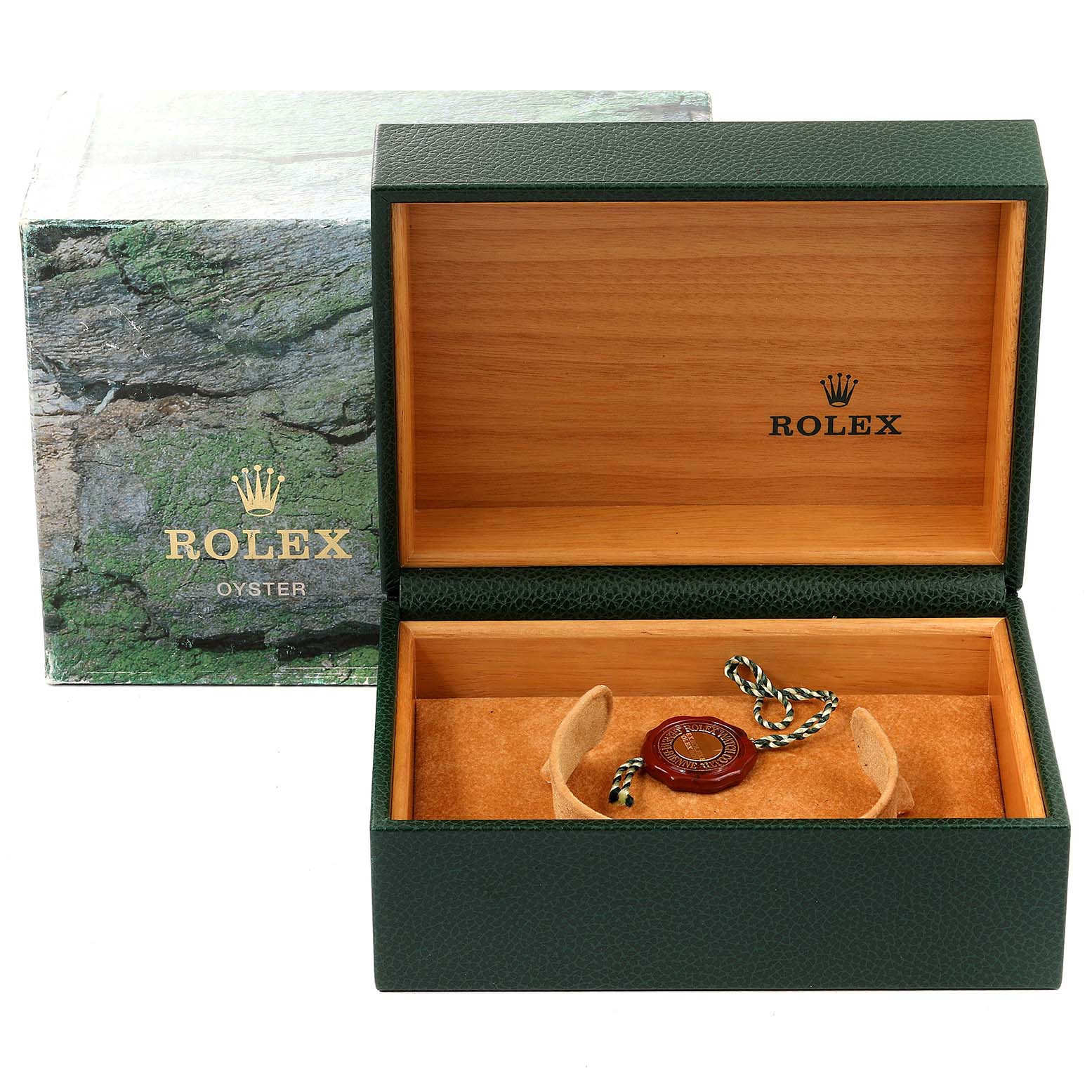 This image shows a Rolex Submariner 16613 Men's Steel and Gold (two tone) Black Dial 16613 Men's Steel and Gold (two tone) Black Dial watch box with an open lid and a hang tag inside.