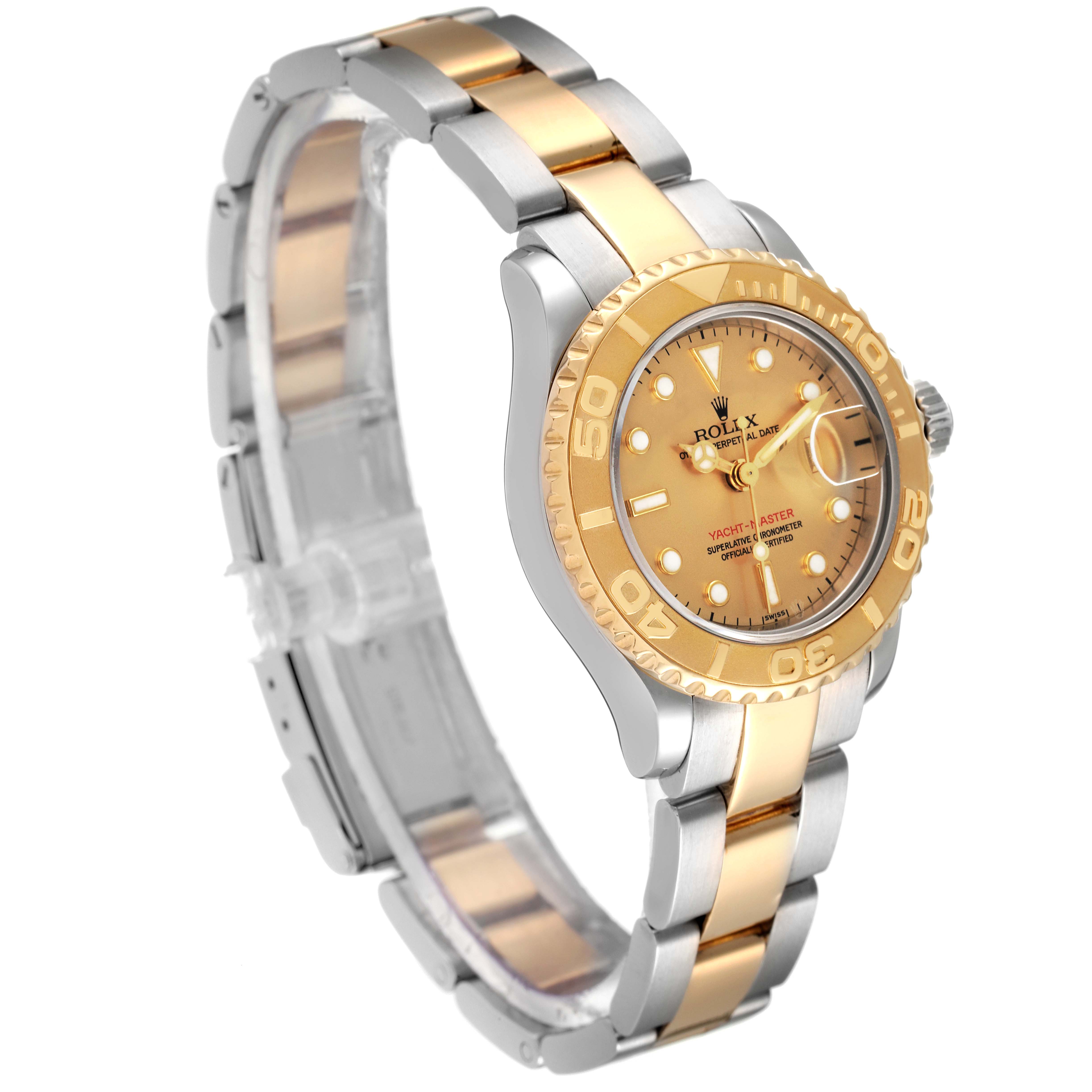 The Rolex Yacht-Master 69623 Women's Steel and Gold (two tone) Champagne Dial 69623 Women's Steel and Gold (two tone) Champagne Dial watch is shown at a slight diagonal angle, displaying the gold bezel, dial, and two-tone bracelet.