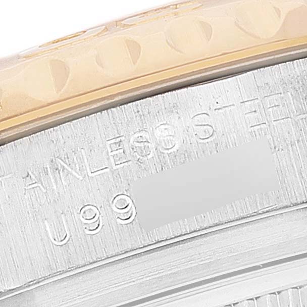 The image shows a close-up of the side of a Rolex Yacht-Master 69623 Women's Steel and Gold (two tone) Champagne Dial 69623 Women's Steel and Gold (two tone) Champagne Dial watch, focusing on the stainless steel case and bezel.