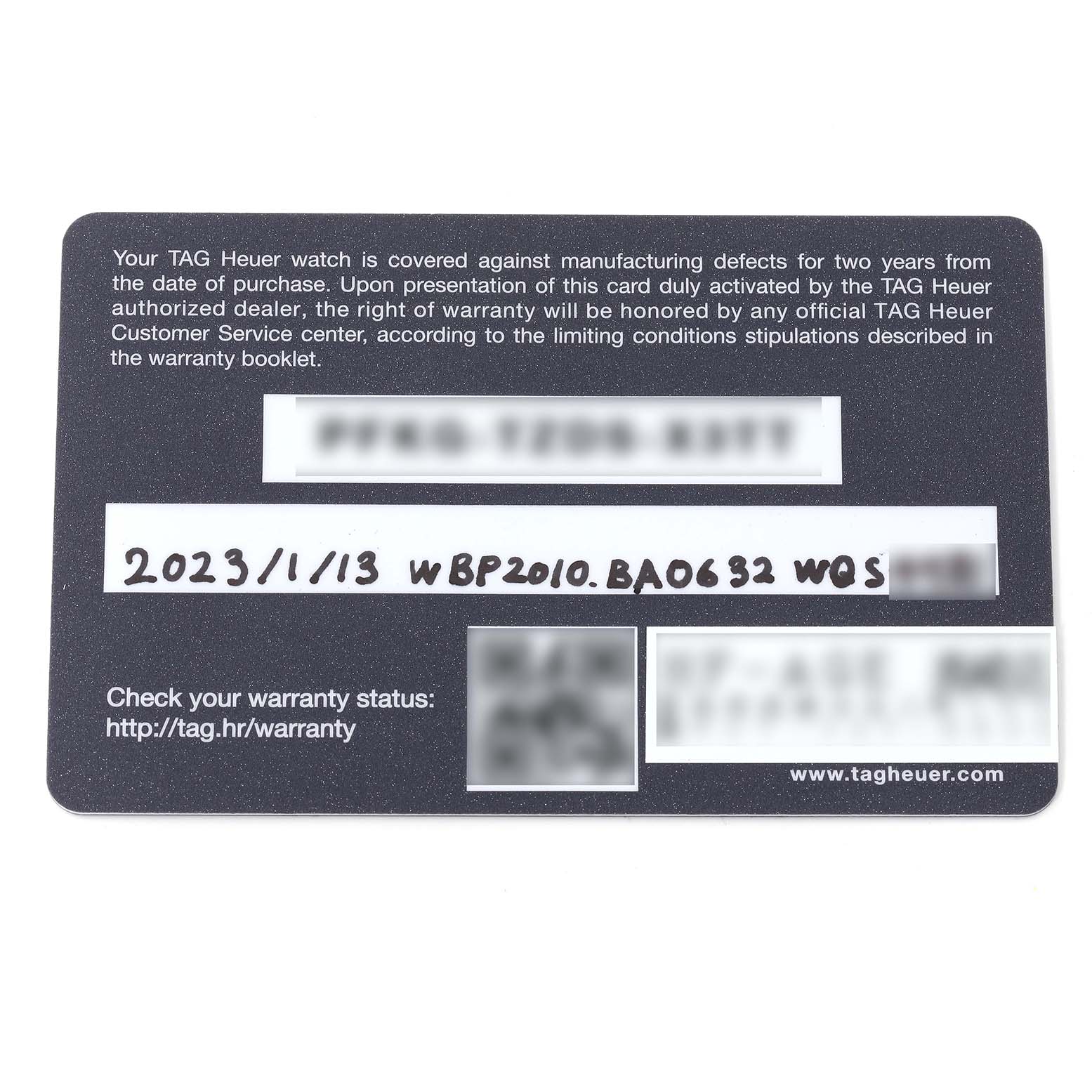 The image shows a warranty card for a Tag Heuer Aquaracer WBP2010.BA0632 Men's Stainless Steel Blue Dial WBP2010.BA0632 Men's Stainless Steel Blue Dial model, displaying warranty details and the model number.