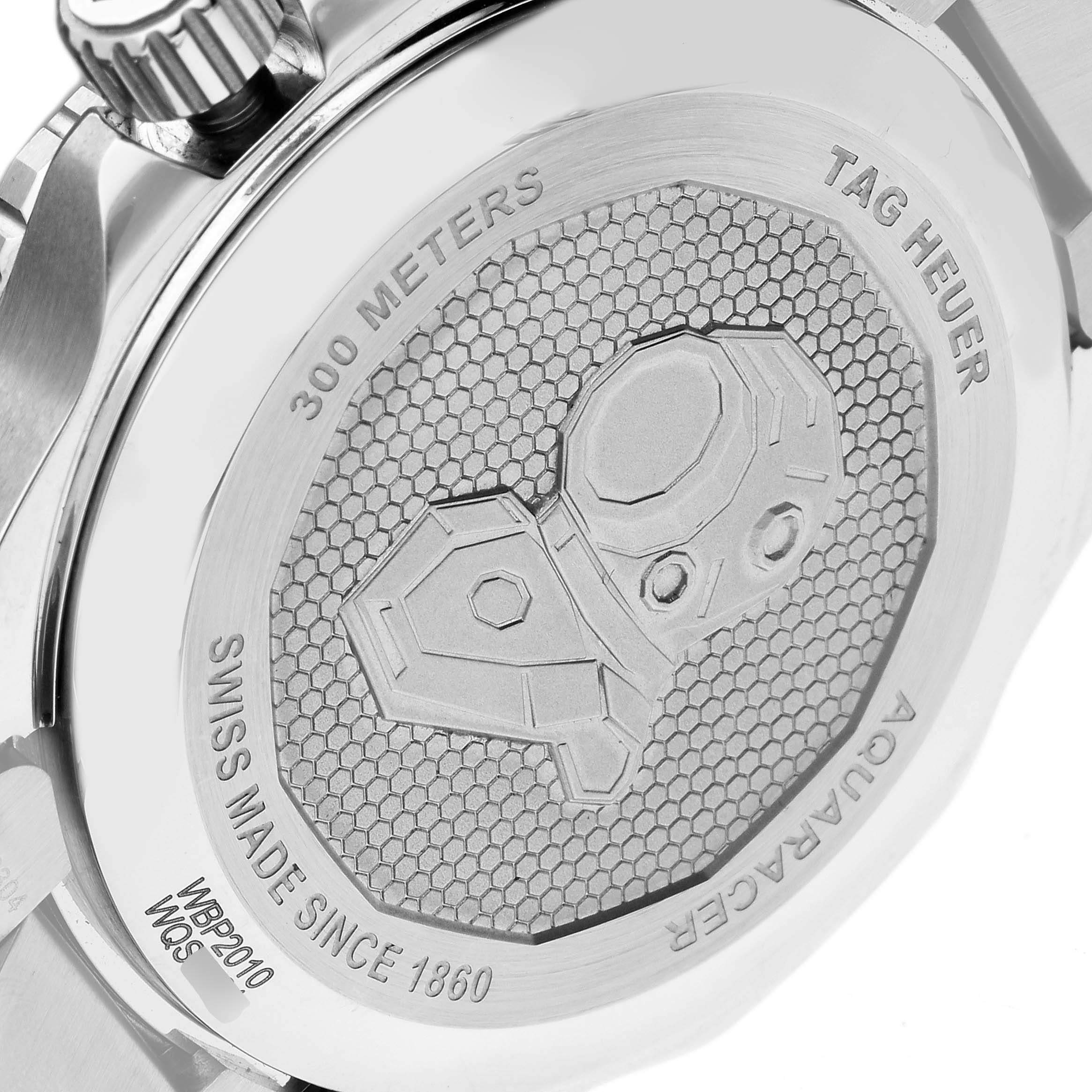 This image shows the back case of the Tag Heuer Aquaracer WBP2010.BA0632 Men's Stainless Steel Blue Dial WBP2010.BA0632 Men's Stainless Steel Blue Dial watch with its engraved details and branding.