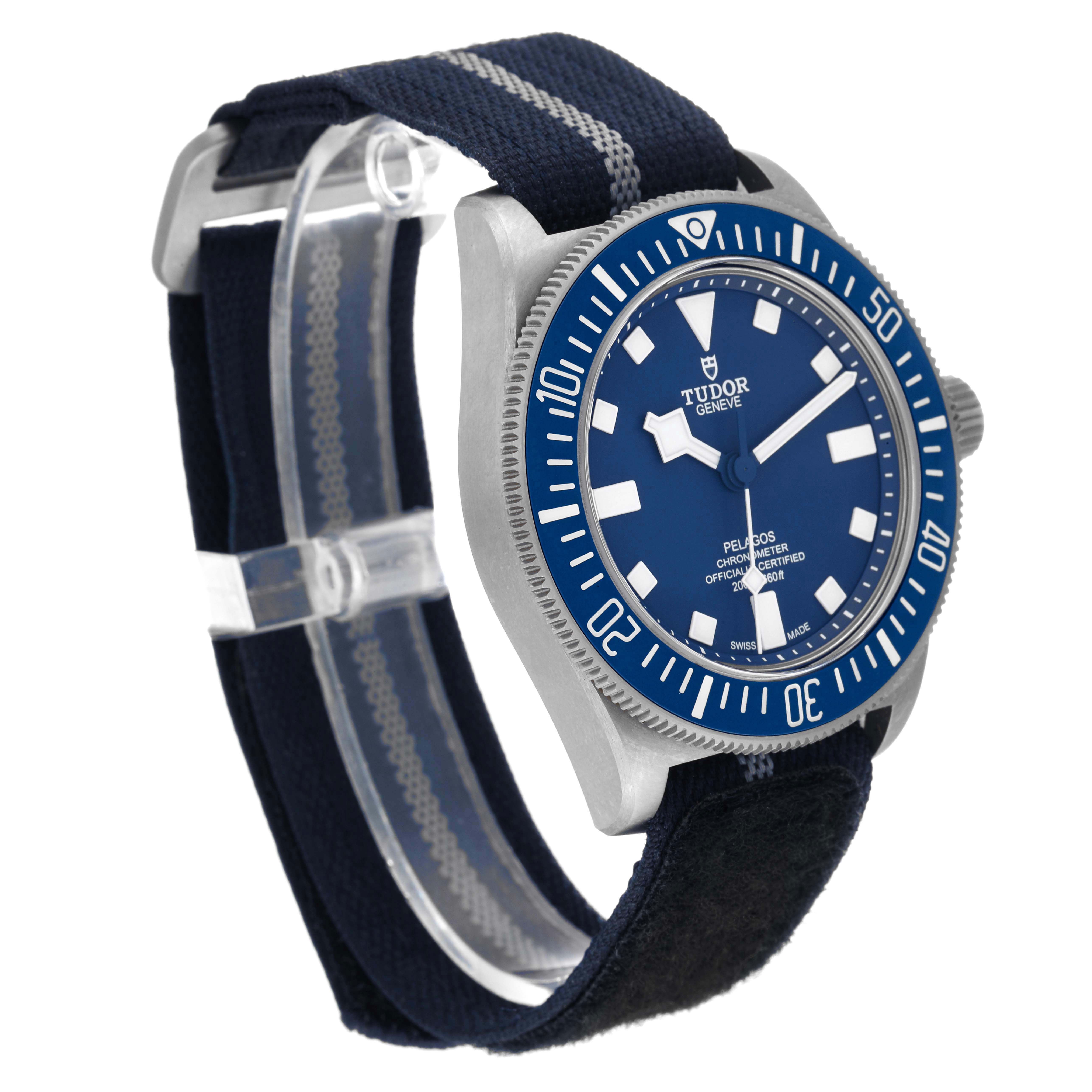The image shows a Tudor Pelagos 25707 Men's Titanium Blue Dial 25707 Men's Titanium Blue Dial watch from a front-left angled view, highlighting the bezel, dial, and fabric strap.