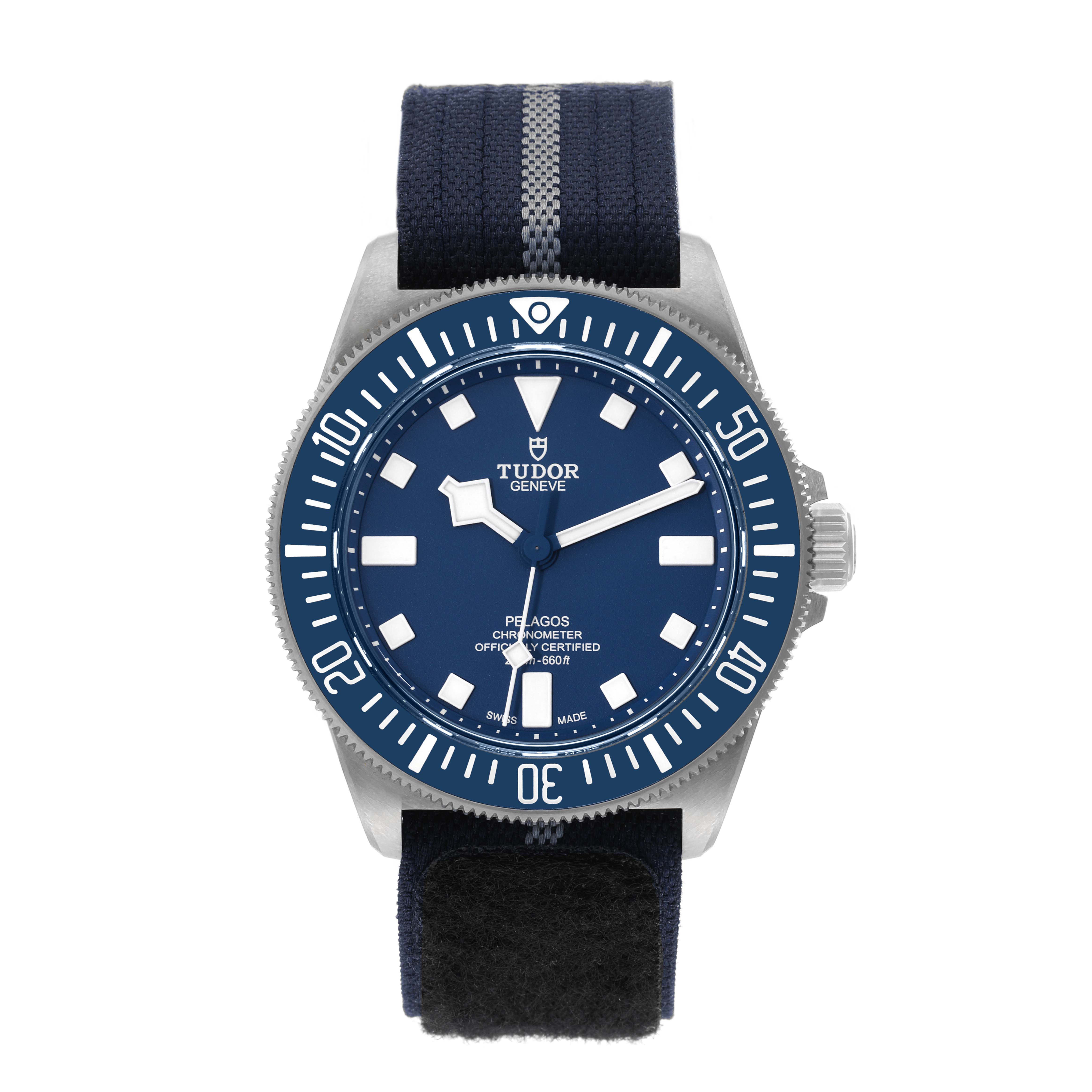 The image shows a frontal view of the Tudor Pelagos 25707 Men's Titanium Blue Dial 25707 Men's Titanium Blue Dial watch, highlighting its dial, bezel, and fabric strap.