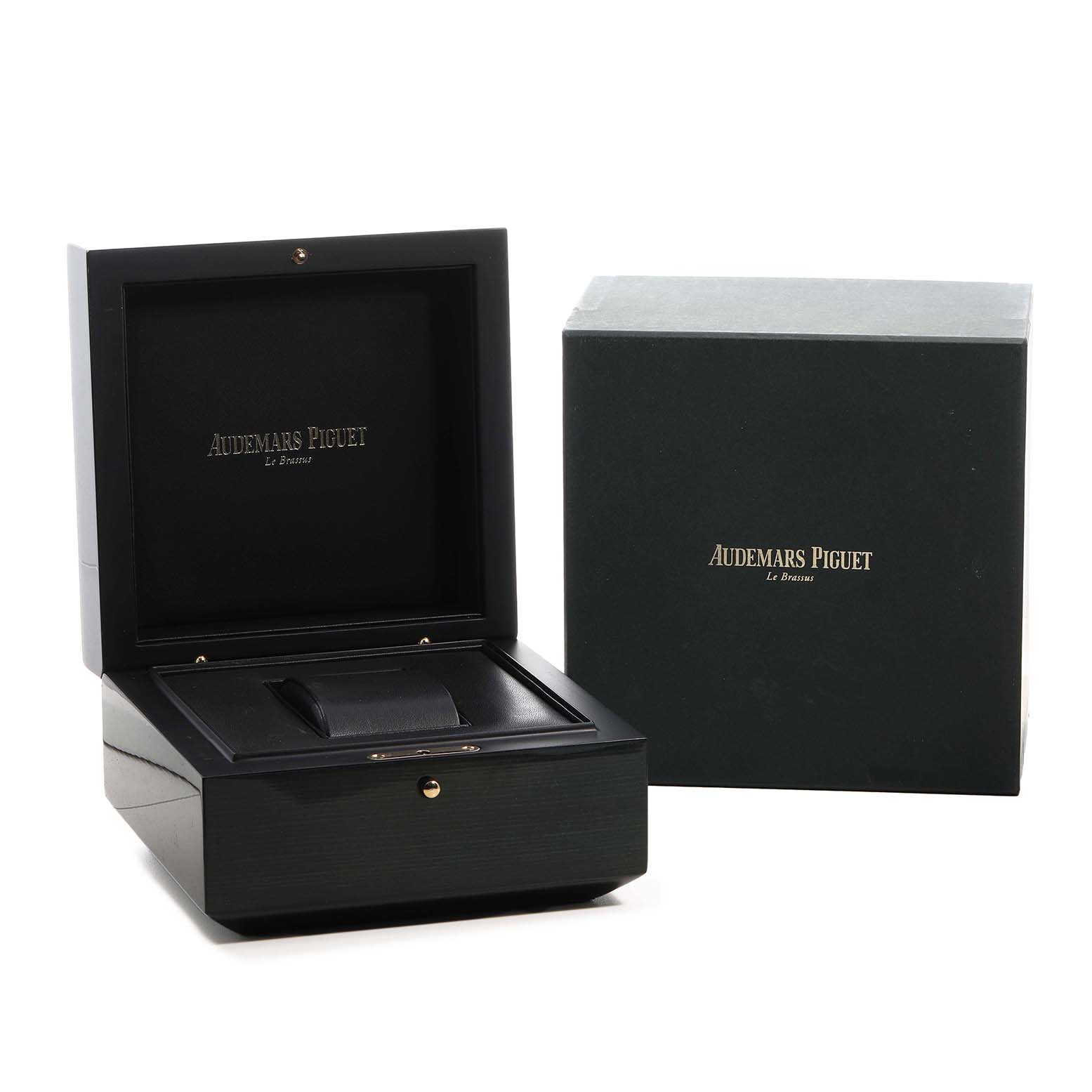 The image shows an open Audemars Piguet Royal Oak Offshore 26170OR.OO.1000OR.01 Men's Rose Gold Silver Dial watch box, along with its exterior packaging.