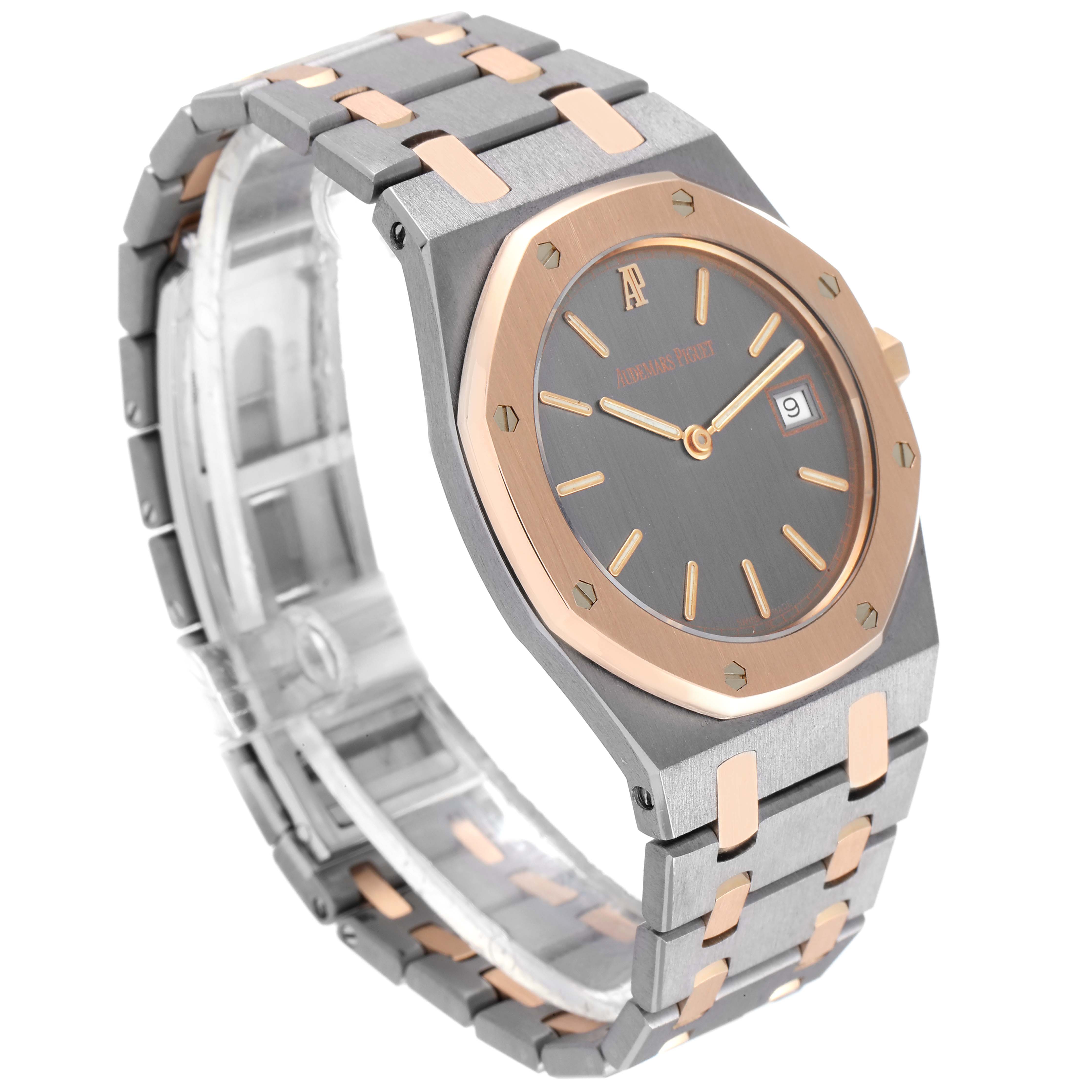 The image shows a side-angle view of an Audemars Piguet Royal Oak 56175TR-OO-0789TR-01 Men's Steel and Gold (two tone) Black Dial 56175TR-OO-0789TR-01 Men's Steel and Gold (two tone) Black Dial watch, highlighting the watch face, bezel, and stainless steel bracelet.