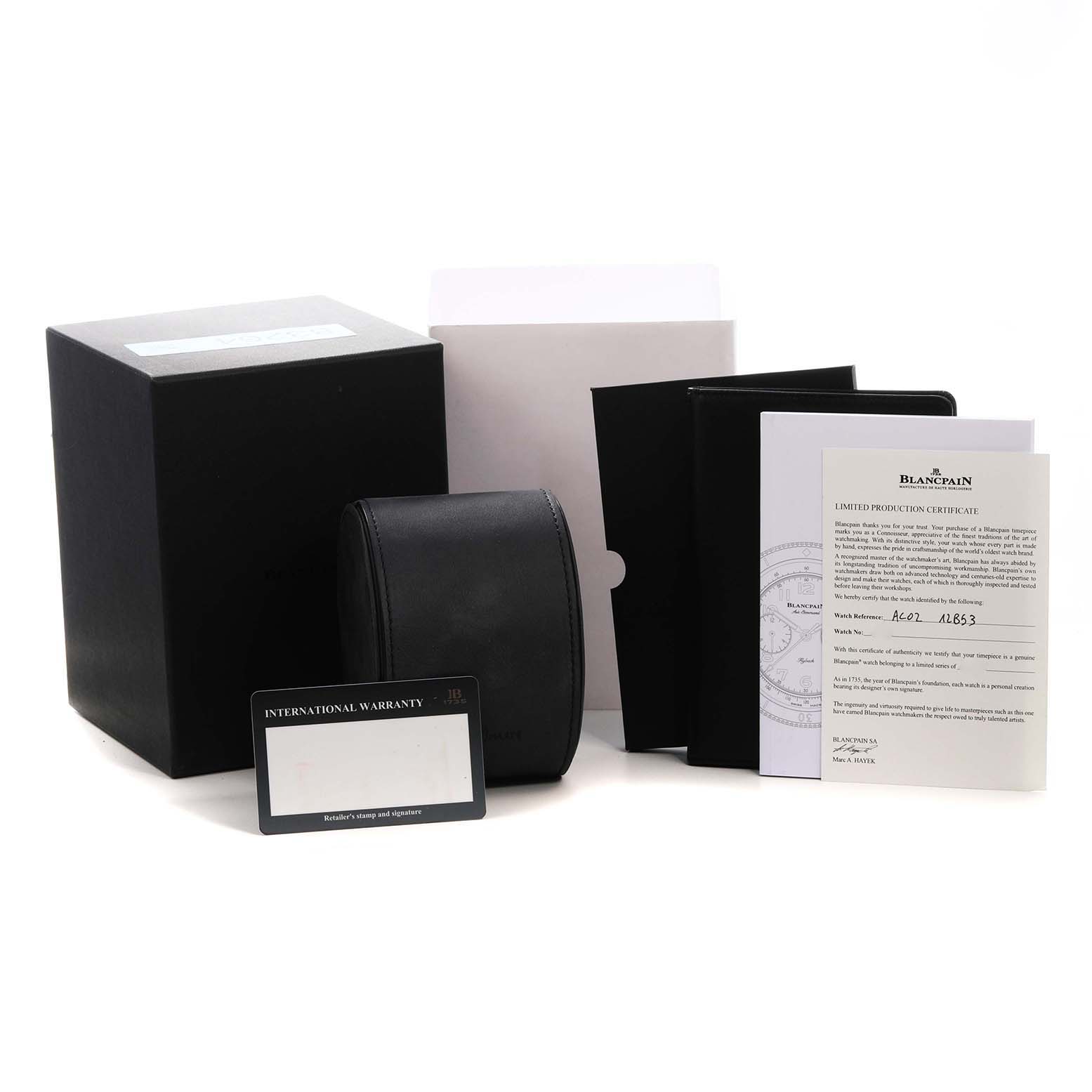 The image shows packaging and accessories for a Blancpain Air Command AC02 12B53 63B Men's Titanium Green Dial watch, including a box, warranty card, and documentation.