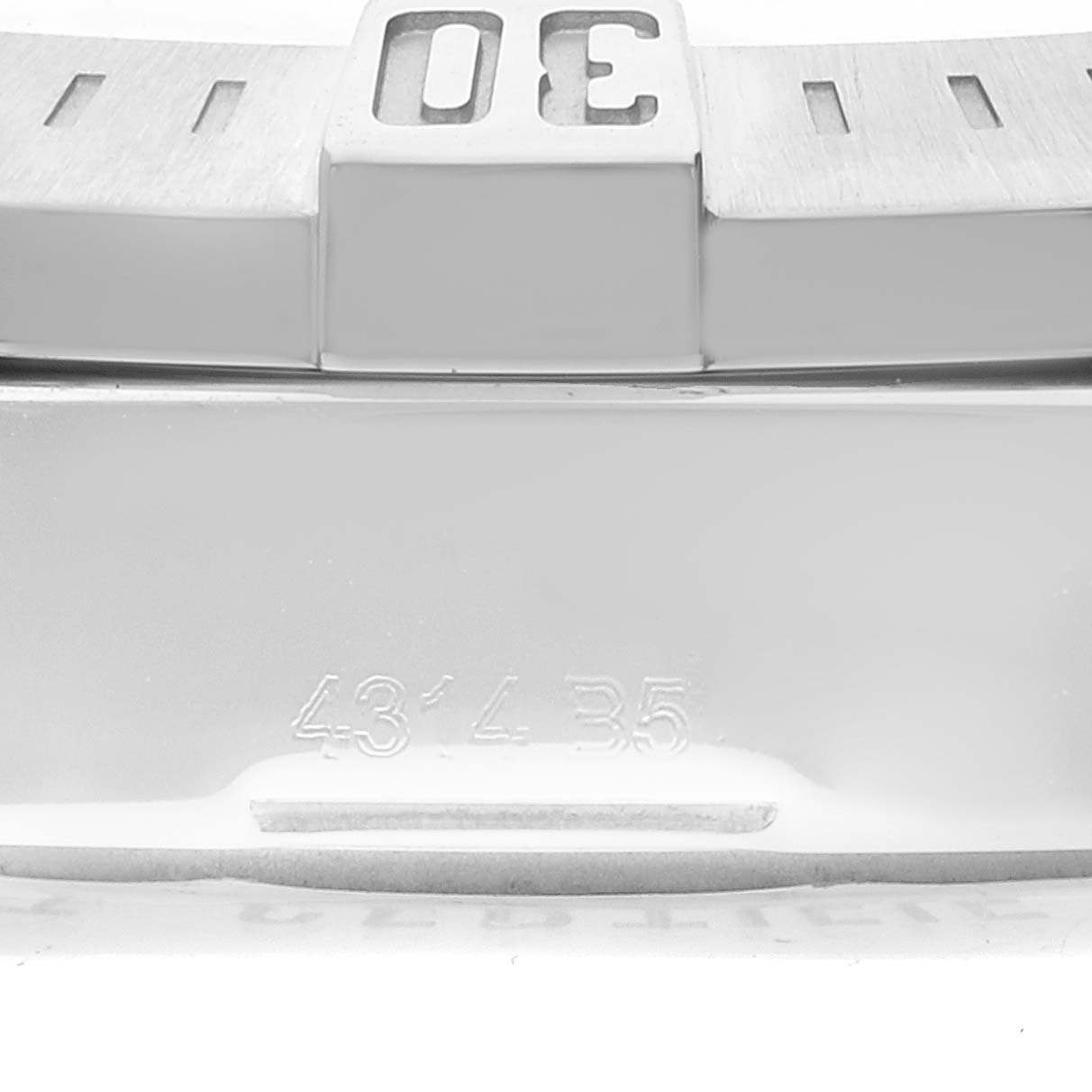 This close-up image shows the bezel and part of the band of the Breitling Colt A17388 Men's Stainless Steel White Dial A17388 Men's Stainless Steel White Dial watch, highlighting the number "30" and the marking "43´4 35."
