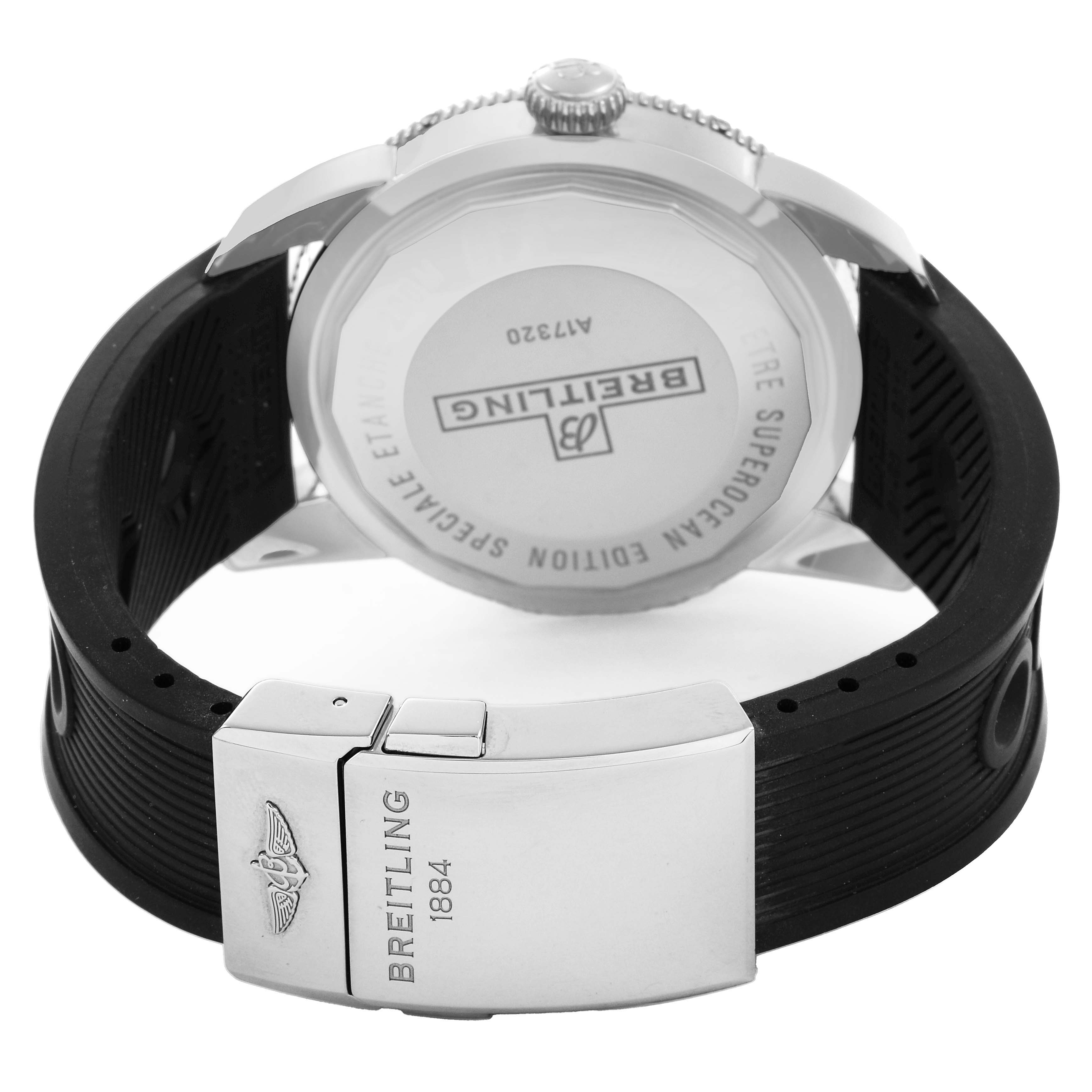 The image shows the back and side of the Breitling Superocean AB2010 Men's Stainless Steel Black Dial watch, highlighting its clasp, straps, and case back.