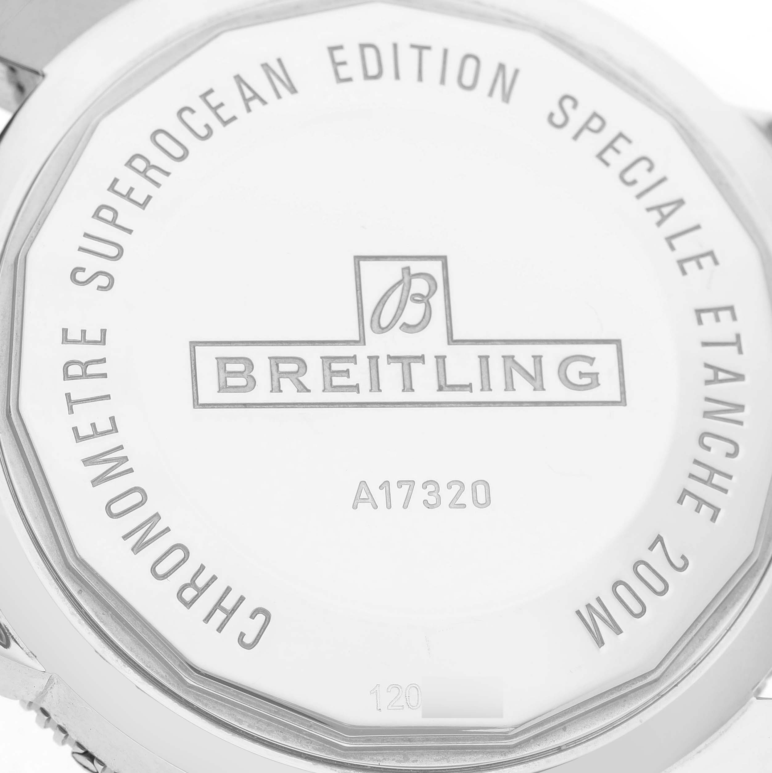 The image shows the case back of a Breitling Superocean AB2010 Men's Stainless Steel Black Dial watch, featuring the brand logo and model details.