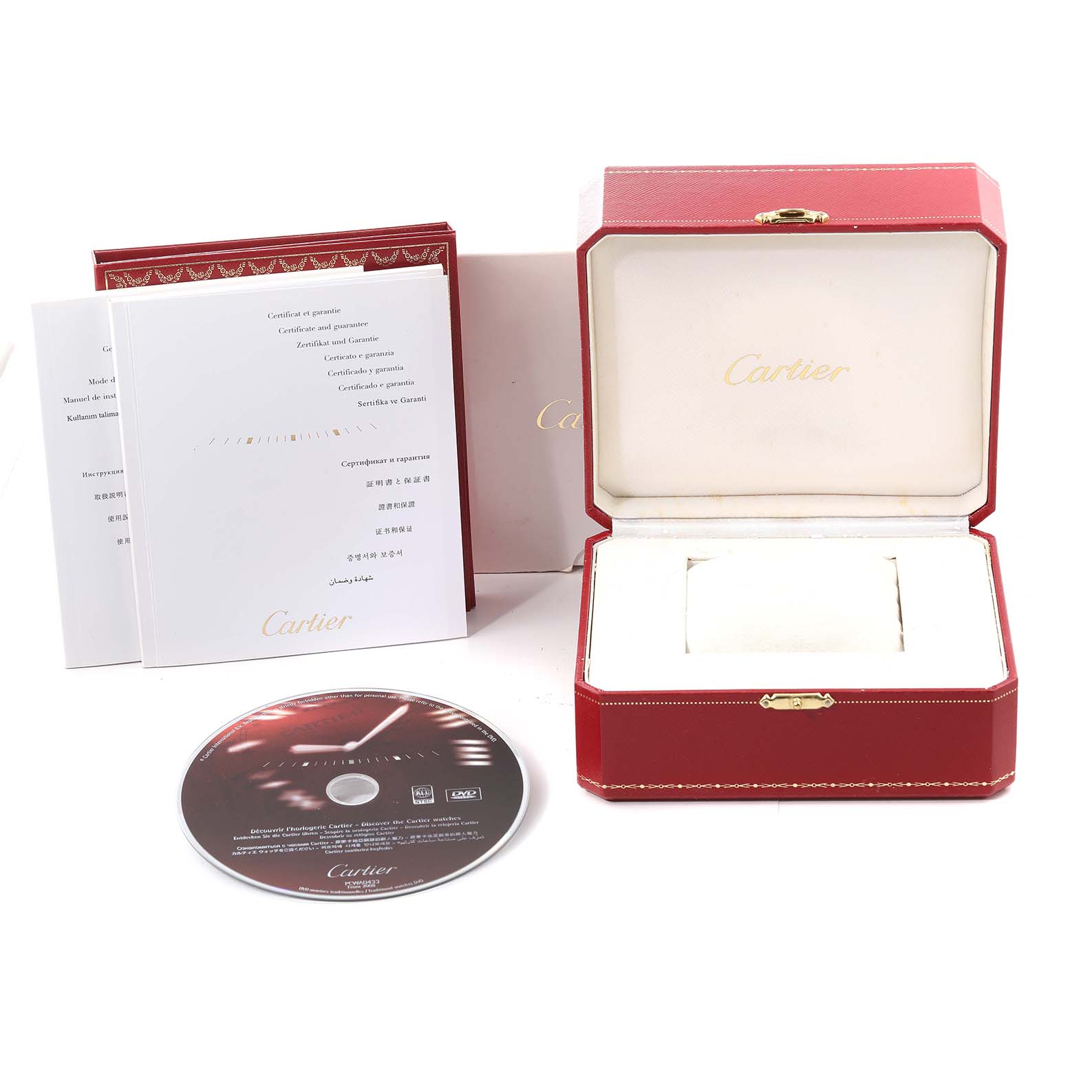 The image shows the packaging, manuals, and a DVD for the Cartier Ballon Bleu W69010Z4 Women
s Stainless Steel Silver Dial W69010Z4 Women
s Stainless Steel Silver Dial watch.