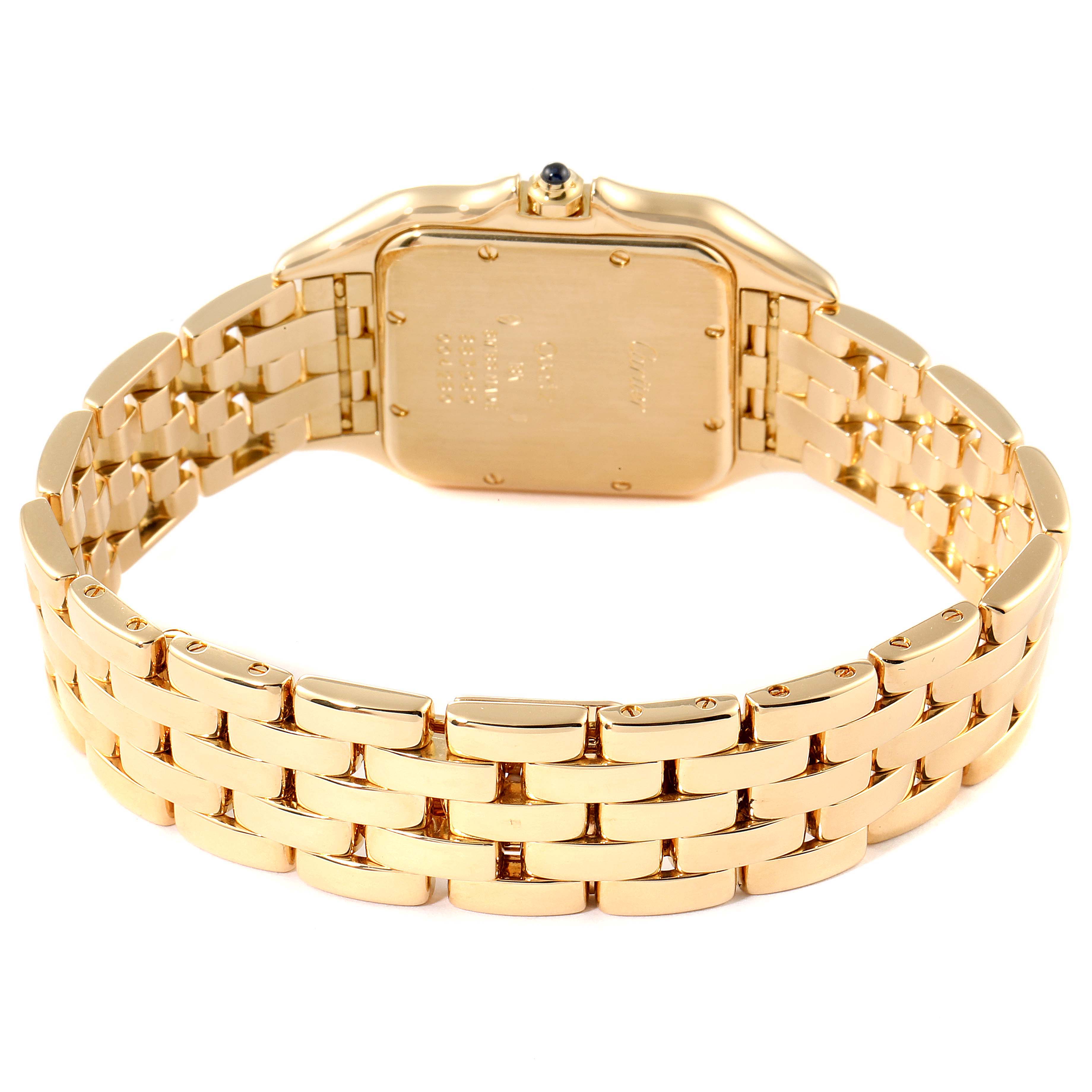 The image shows the back view of a gold Panthere de Cartier watch, showcasing its bracelet and case back.