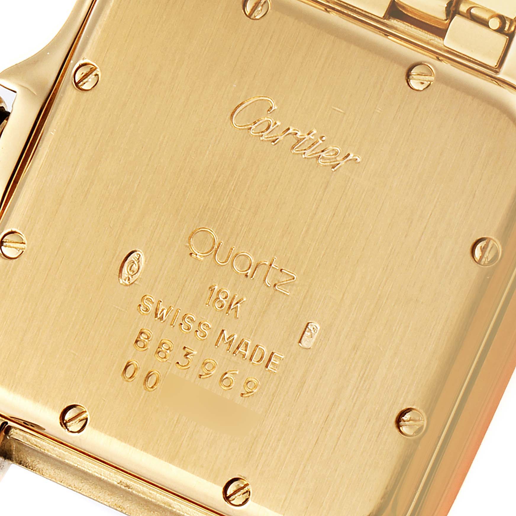 The image shows the back case of a Cartier Panthere W25014B9 Men's Yellow Gold Silver Dial W25014B9 Men's Yellow Gold Silver Dial model watch, highlighting its engravings and screws.