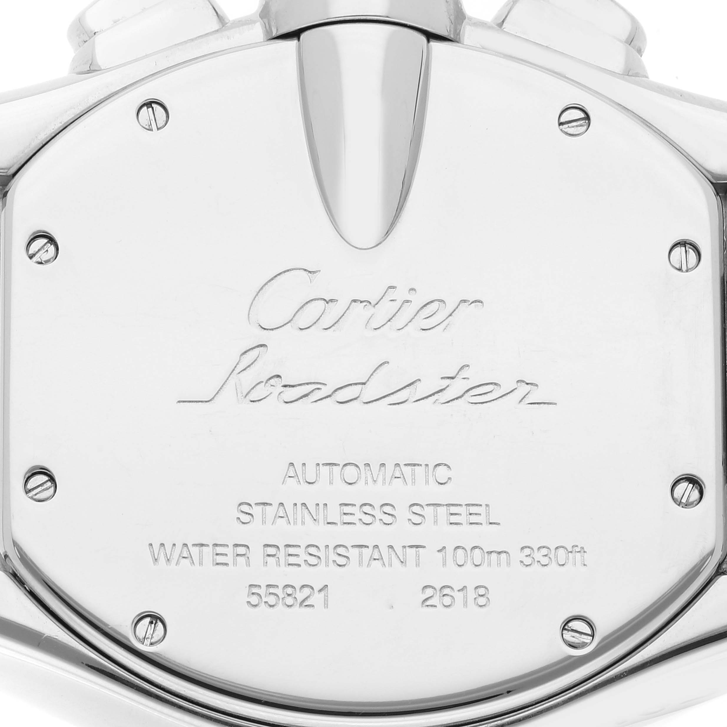 The image shows the back case of a Cartier Roadster W62019X6 Men's Stainless Steel Silver Dial W62019X6 Men's Stainless Steel Silver Dial watch with engraved details about its features and serial numbers.