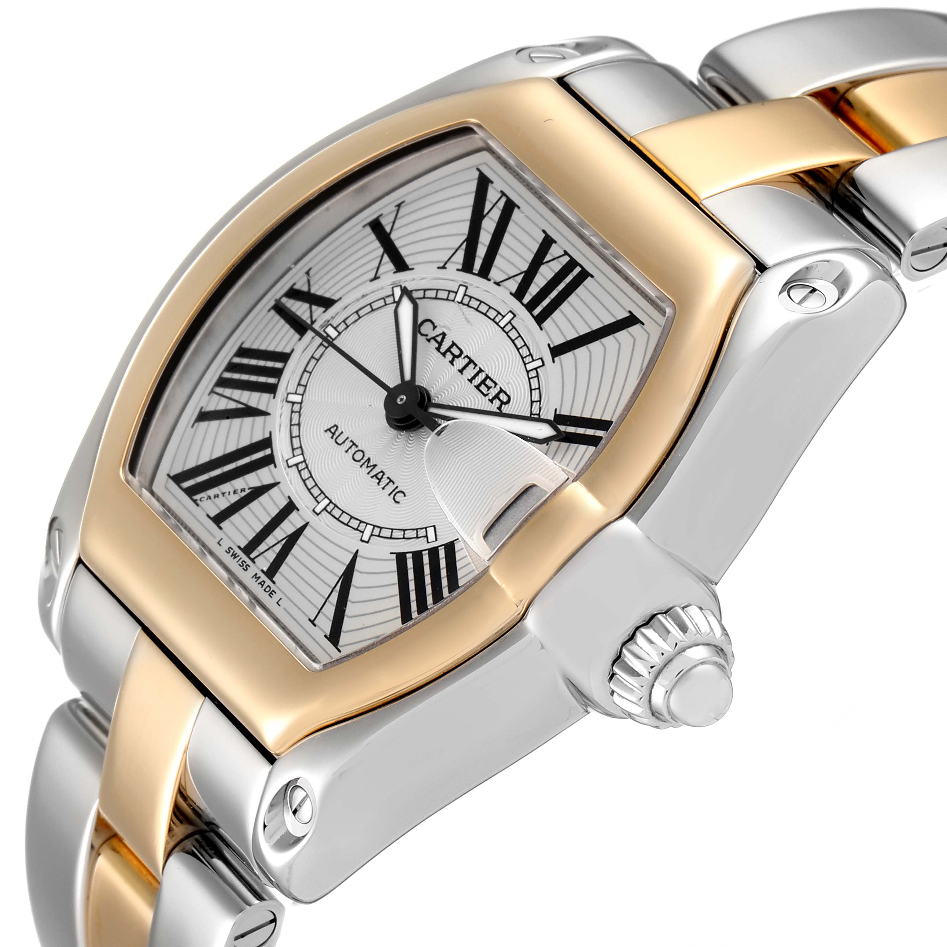 The image shows a close-up angled view of a Cartier Roadster W62031Y4 Men's Steel and Gold (two tone) Silver Dial W62031Y4 Men's Steel and Gold (two tone) Silver Dial watch focusing on the dial, crown, and bracelet.