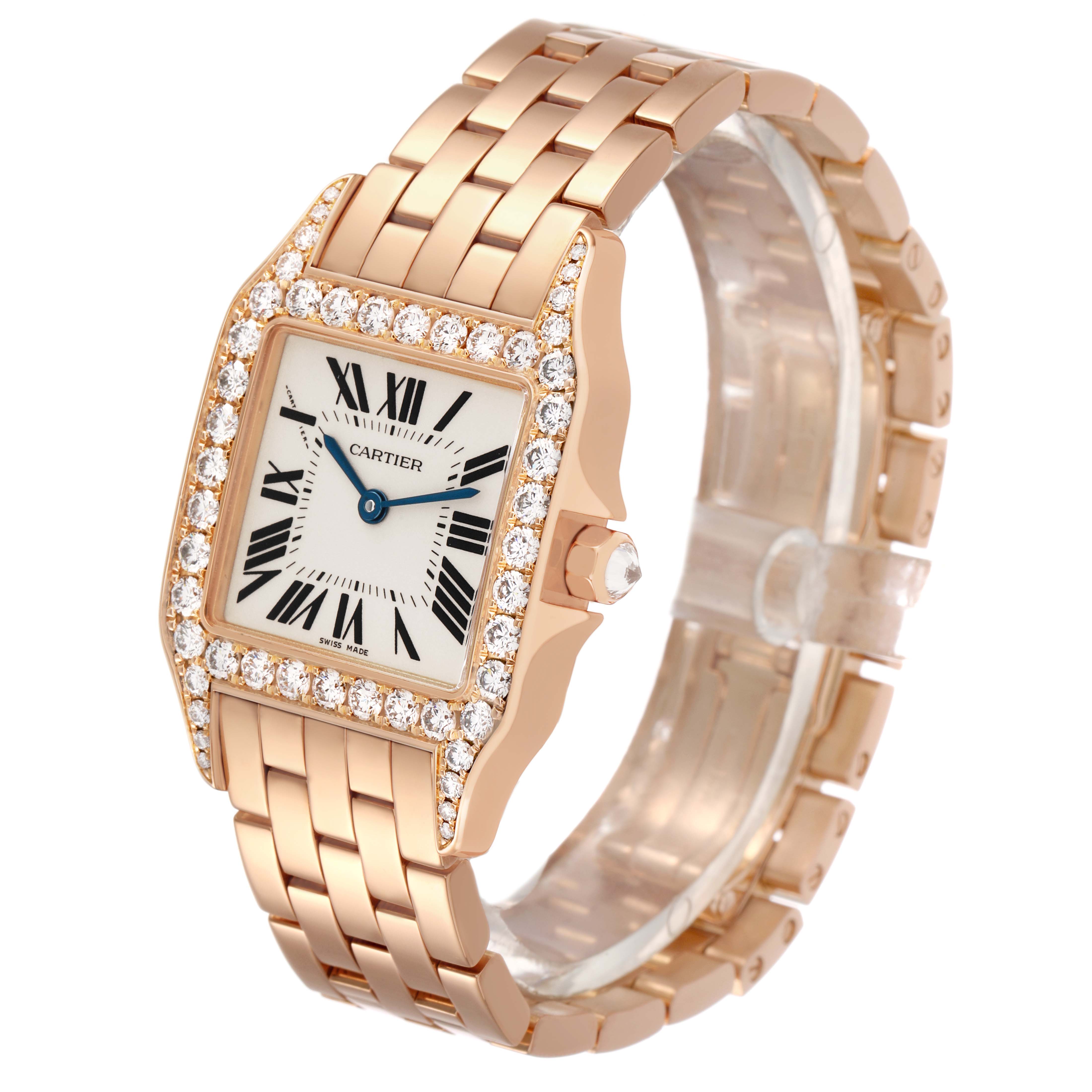 The Cartier Santos Demoiselle WF9007Z8 Women's Yellow Gold Silver Dial watch is shown at a three-quarter angle, highlighting its diamond-set bezel, face, and rose gold bracelet.