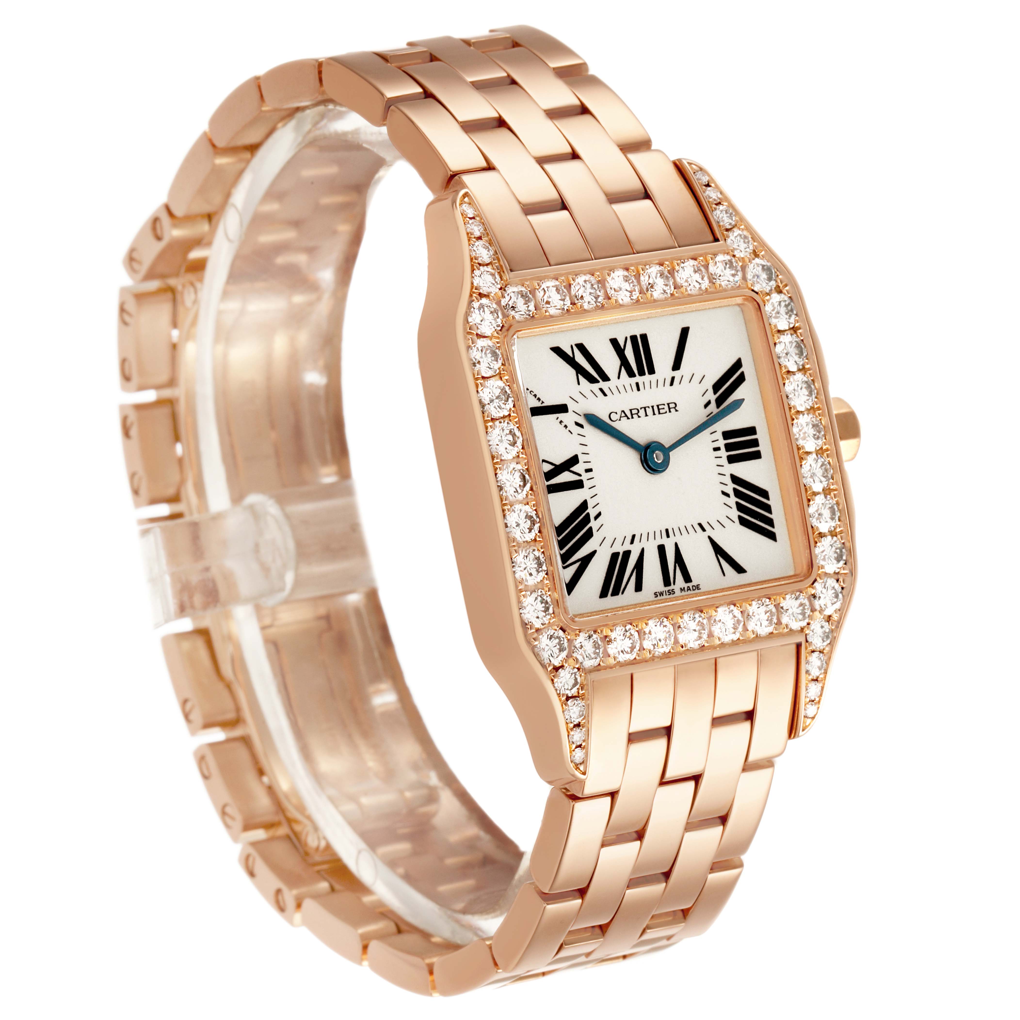 The Santos Demoiselle by Cartier is shown at a three-quarter angle, displaying its diamond-set bezel, Roman numeral dial, and linked bracelet.