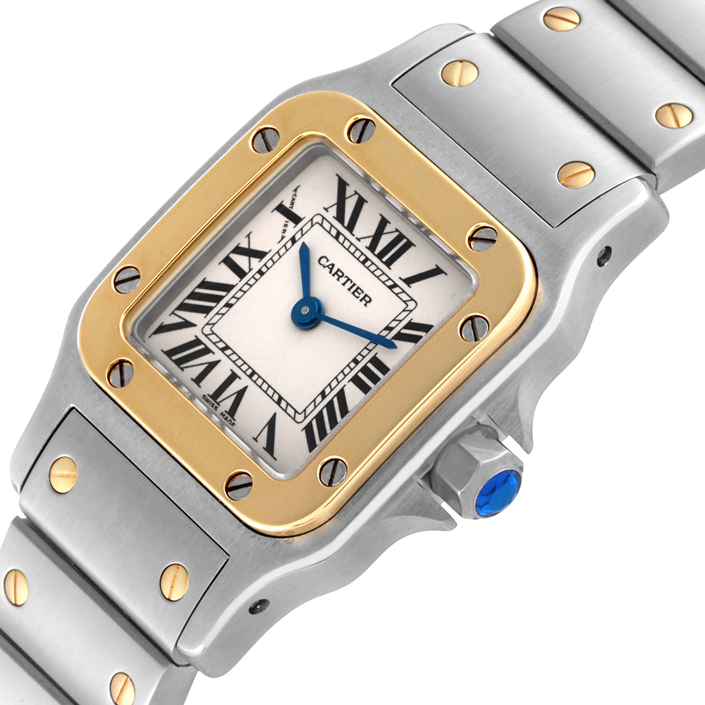 This image shows a close-up angle of a Cartier Santos W20012C4 Women's Steel and Gold (two tone) Silver Dial W20012C4 Women's Steel and Gold (two tone) Silver Dial watch, highlighting its face, bezel, crown, and part of the bracelet.