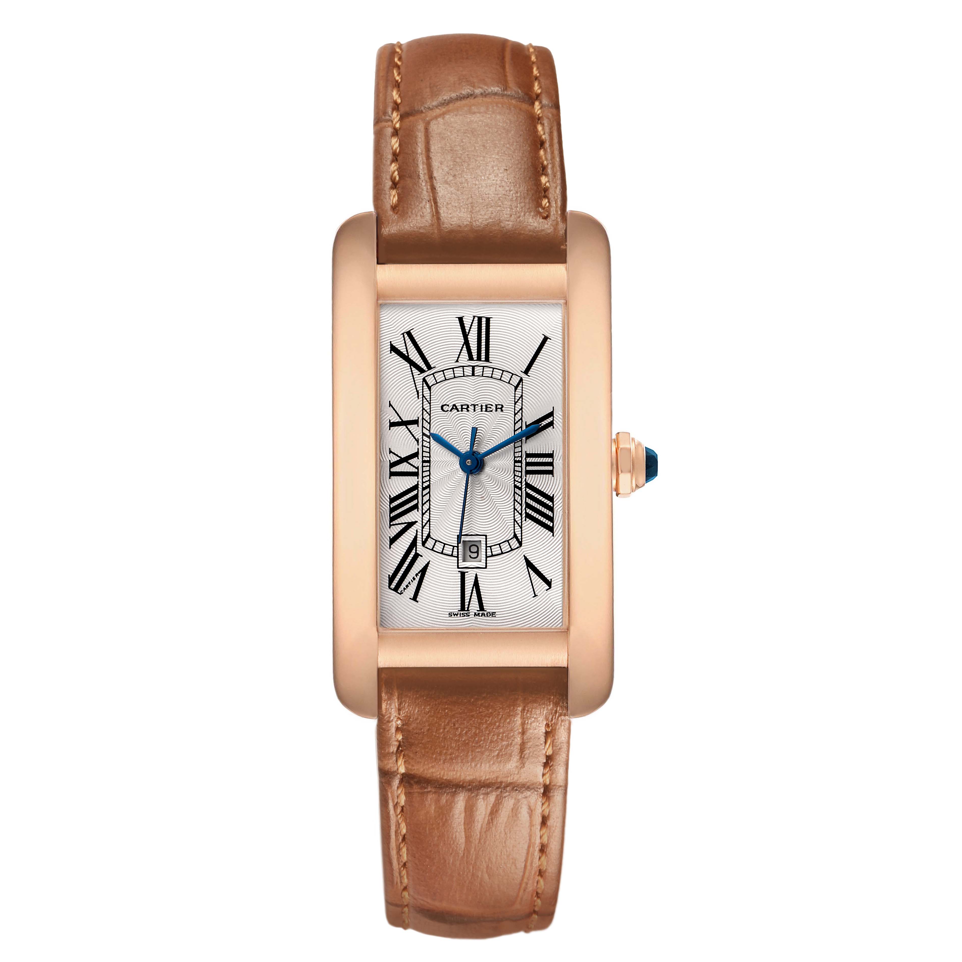 The Cartier Tank Americaine W2620030 Women's Rose Gold Silver Dial watch is shown from a front angle, displaying its rectangular face, Roman numerals, blue hands, and brown leather strap.