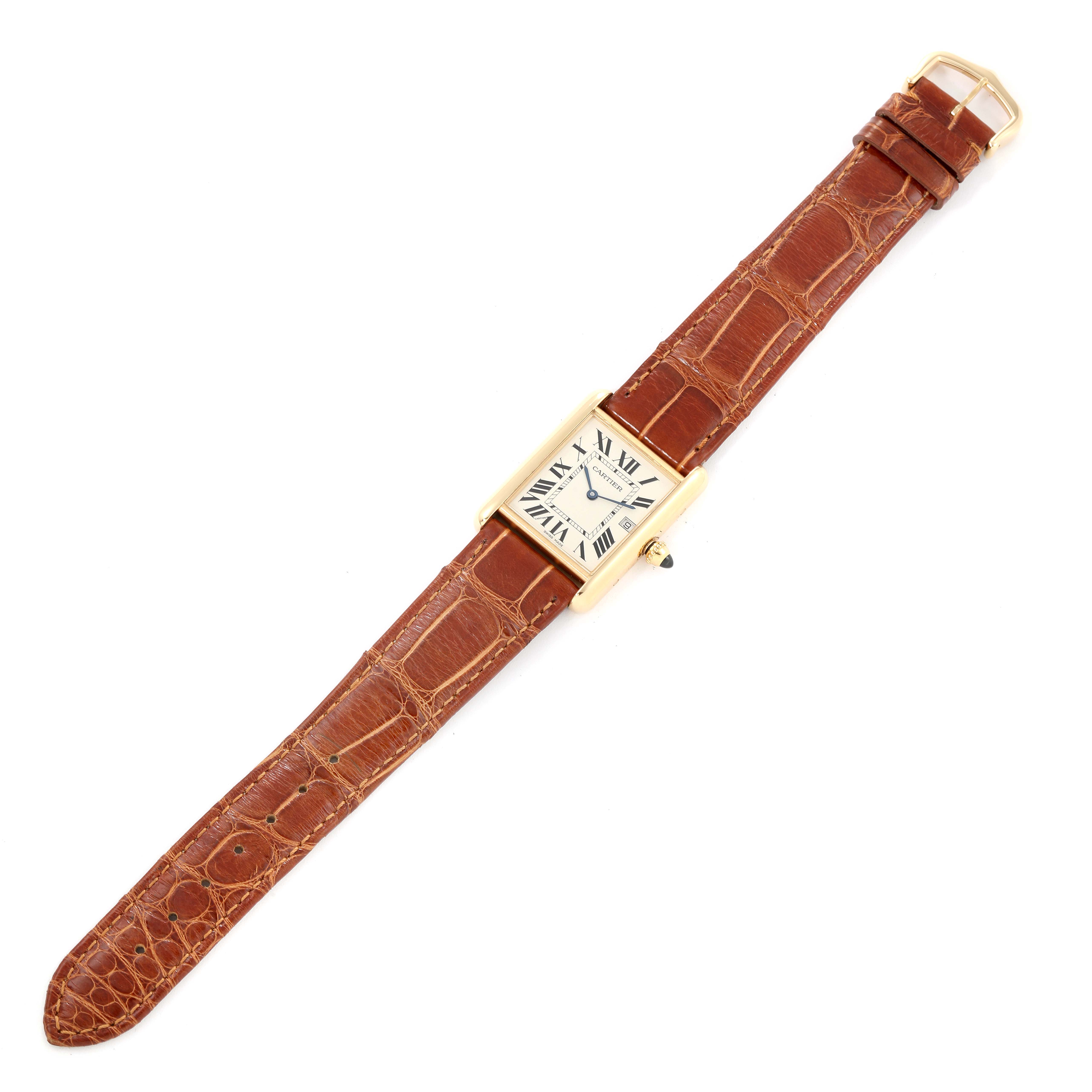 The image shows the Cartier Tank Louis W1529756 Men's Yellow Gold Silver Dial W1529756 Men's Yellow Gold Silver Dial watch in a top-down view, featuring its brown leather strap and square face with Roman numerals.