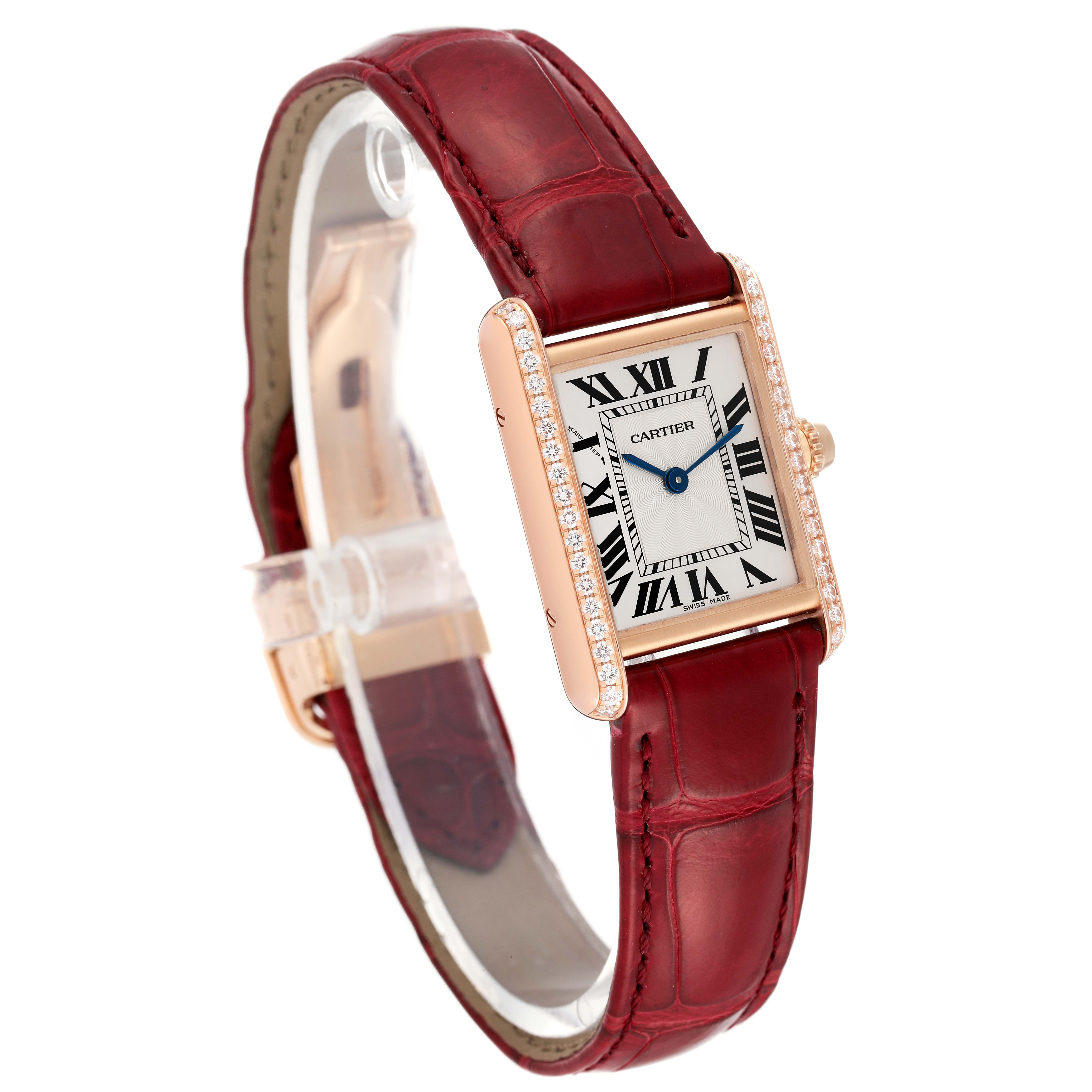The Cartier Tank Louis WJTA0037 Women's Rose Gold Silver Dial WJTA0037 Women's Rose Gold Silver Dial watch is shown from an angle highlighting the rectangular dial, red strap, and diamond-set bezel.