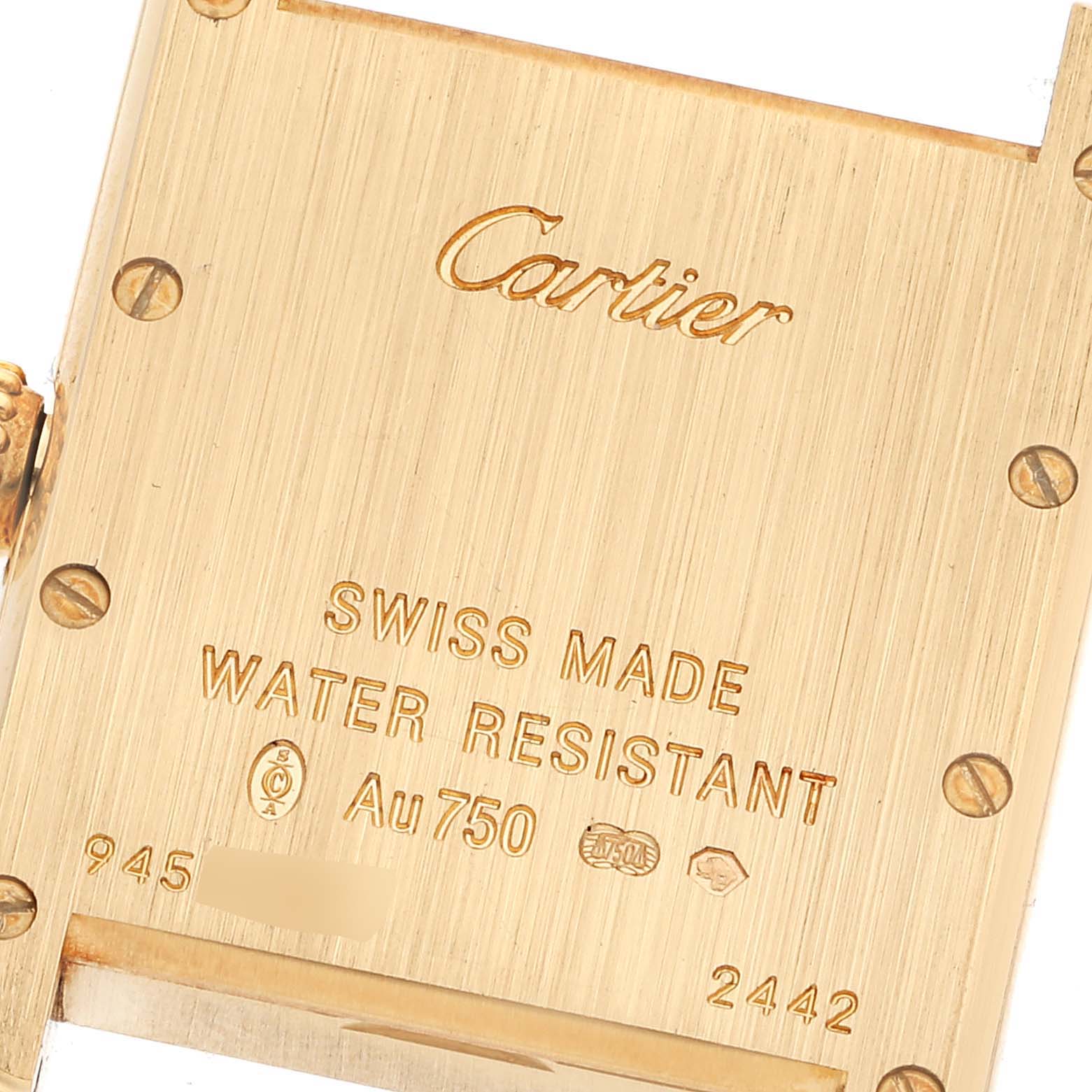 The image shows the back case of the Cartier Tank Louis W1529856 Women's Yellow Gold Silver Dial W1529856 Women's Yellow Gold Silver Dial watch, highlighting its engravings and screw details.