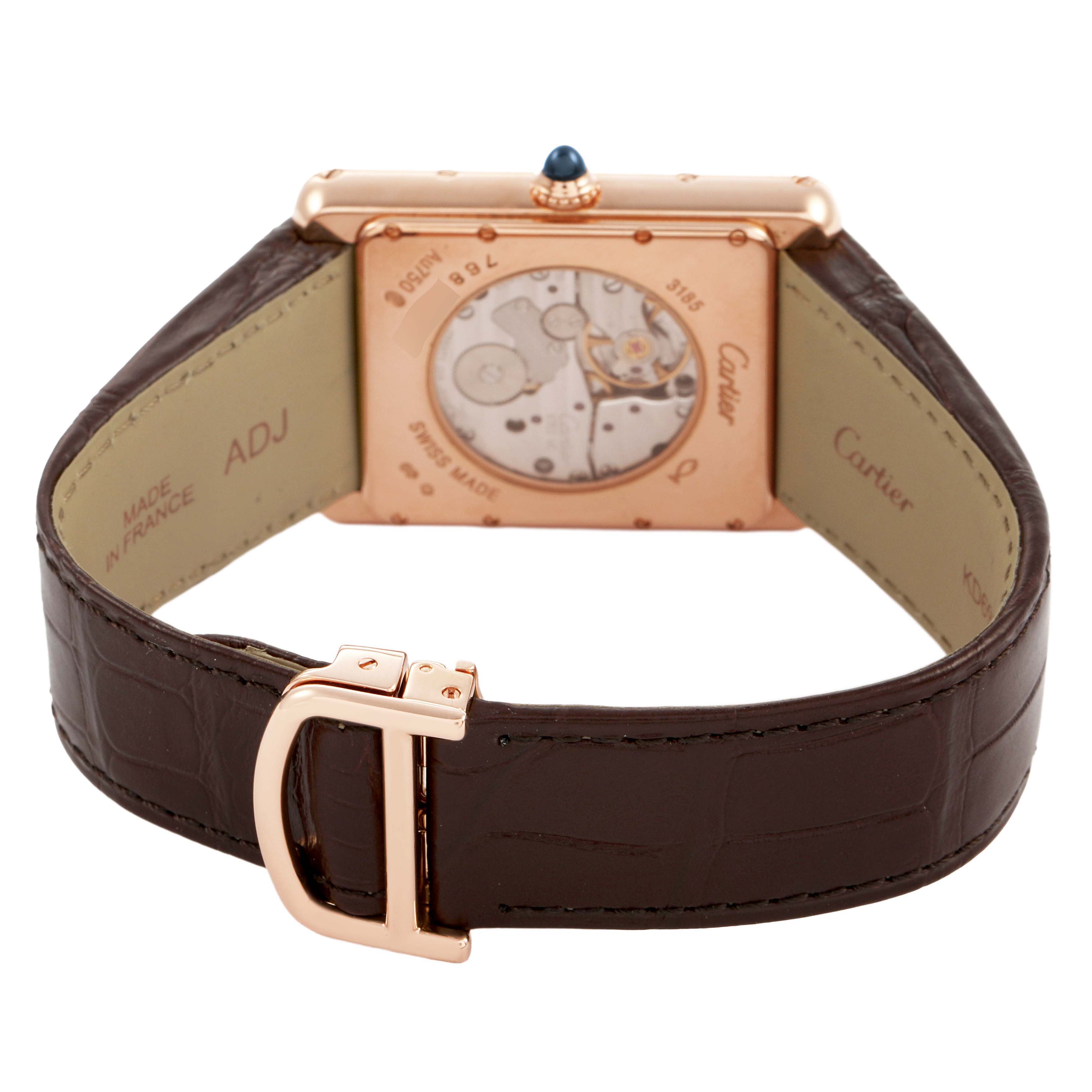 The image shows the back of a Cartier Tank Louis W1560002 Men's Rose Gold Brown Dial watch, highlighting the movement and brown leather strap with a gold buckle.