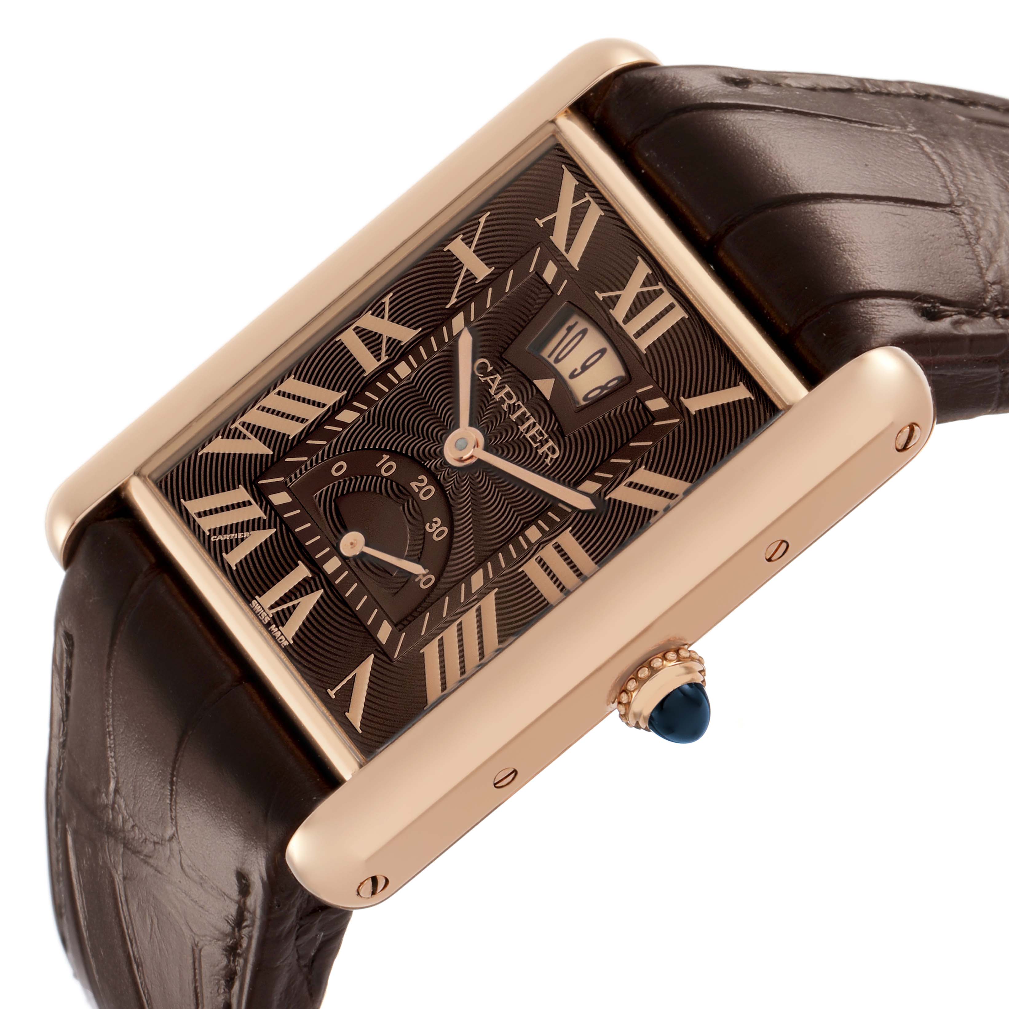 The Cartier Tank Louis W1560002 Men's Rose Gold Brown Dial watch is shown at an angled view, highlighting its rectangular case, brown leather strap, and crown with a gemstone.