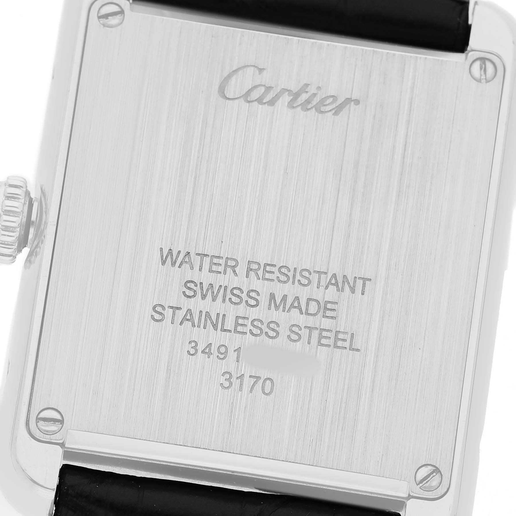 The image shows the back case of a Cartier Tank Solo WSTA0030 Women's Stainless Steel Silver Dial, highlighting its water resistance, Swiss made label, and stainless steel material.