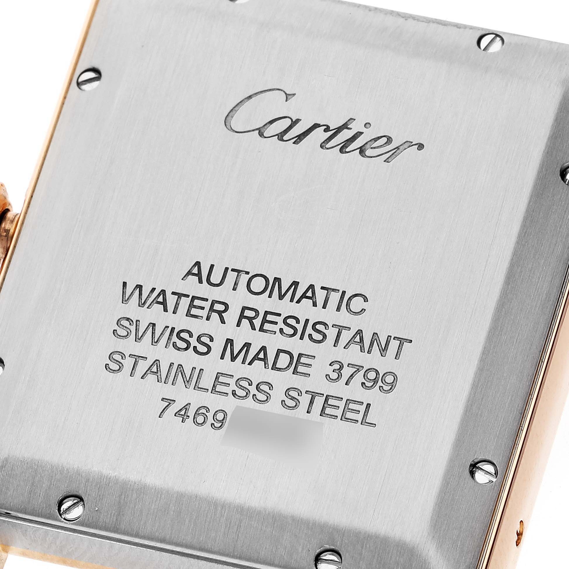 The image shows the back case of a Cartier Tank Solo W5200026 Men's Rose Gold Silver Dial W5200026 Men's Rose Gold Silver Dial, showcasing its engravings and screws.