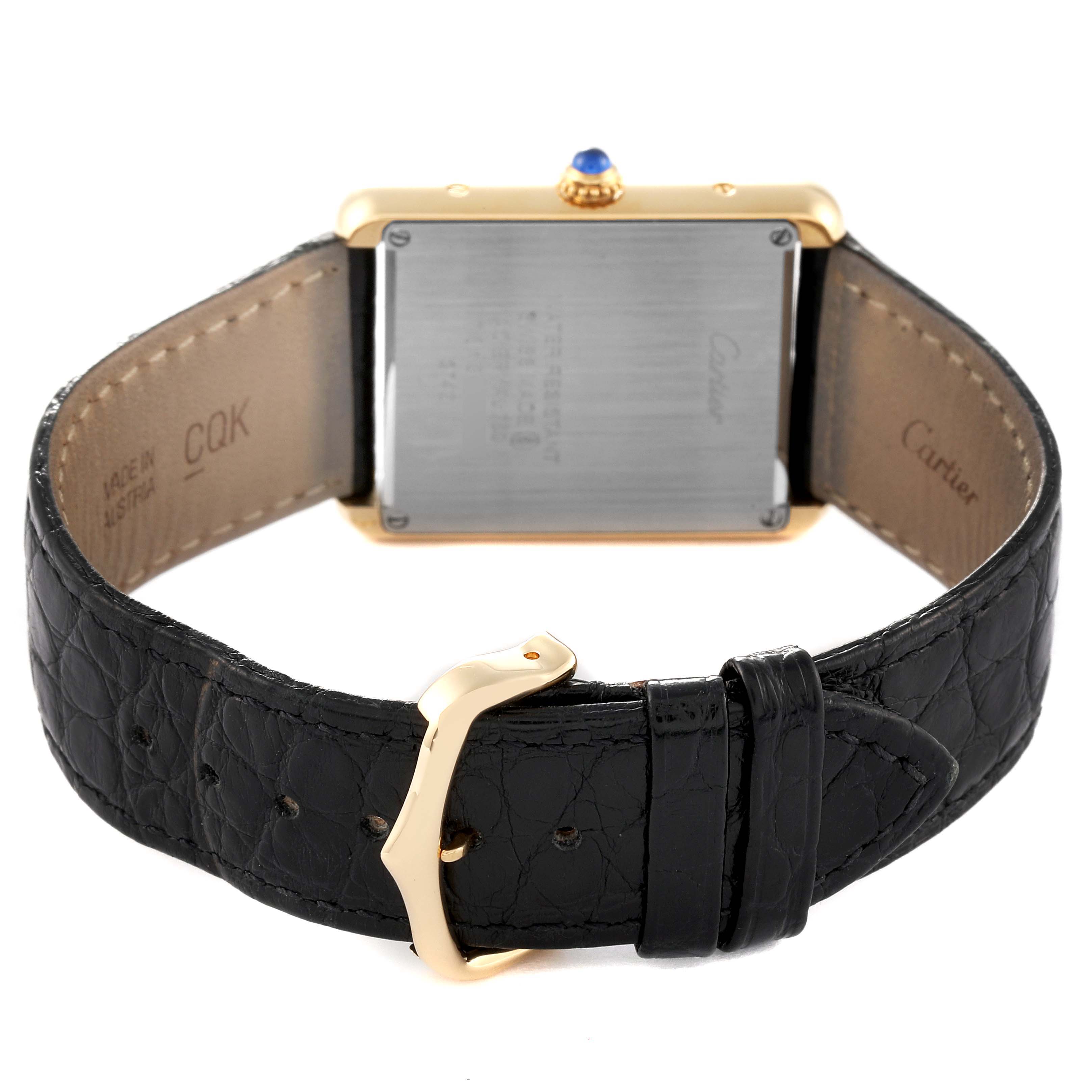 This image shows the back of a Tank Solo watch by Cartier, including the strap and clasp.