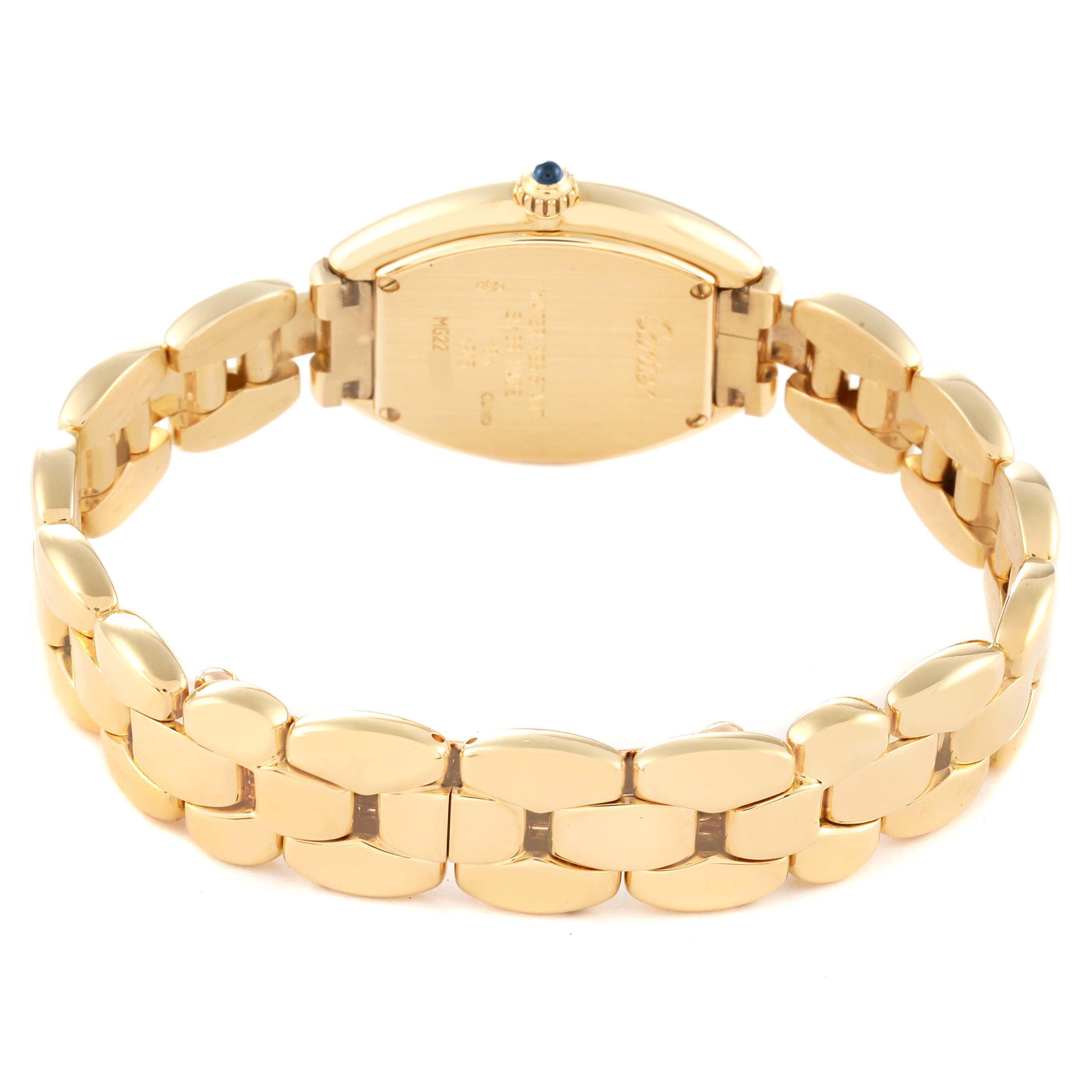 This image shows the back and bracelet of the Cartier Tortue 1945 Women's Yellow Gold Silver Dial 1945 Women's Yellow Gold Silver Dial watch at a slightly angled rear view.