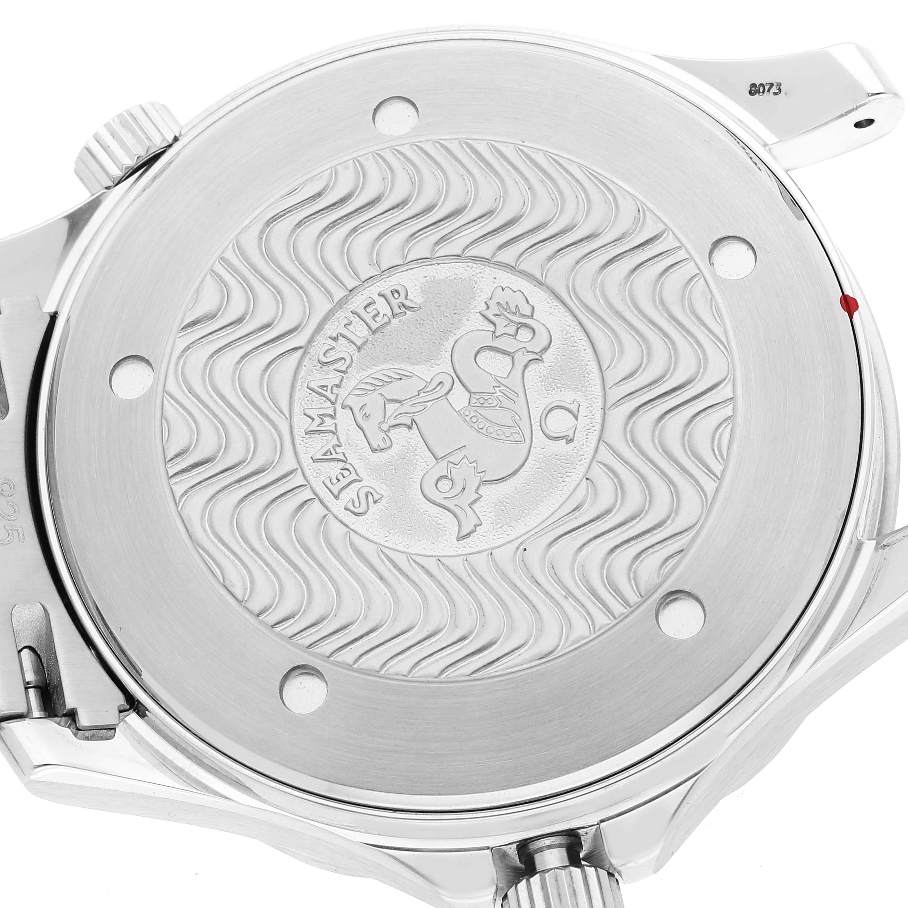 The image shows the back case of the Omega Seamaster 2455.80.00 Men's Stainless Steel Blue Dial 2455.80.00 Men's Stainless Steel Blue Dial watch, highlighting its engraved design.