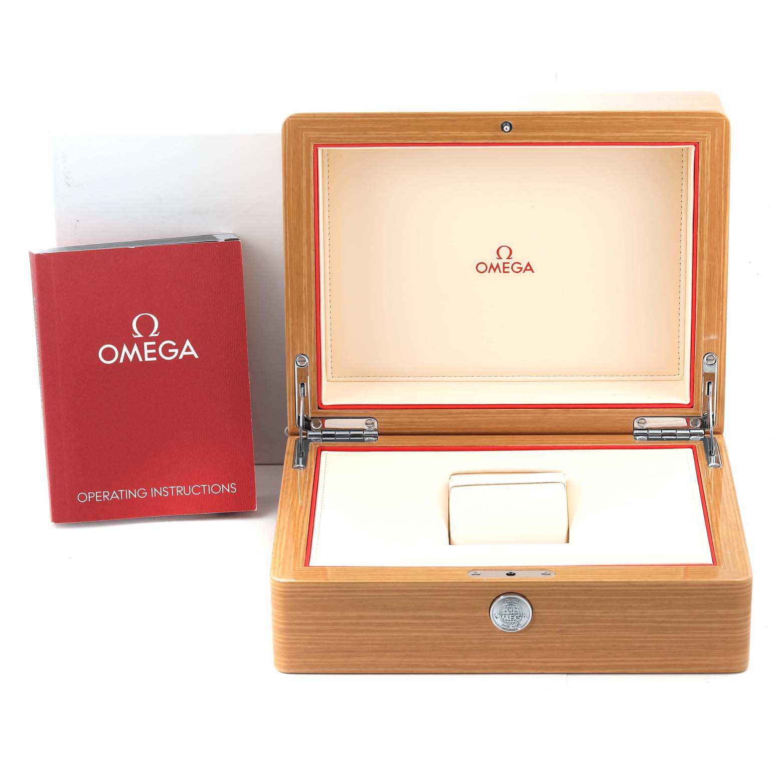 This image shows an open Omega Speedmaster 323.30.40.40.02.001 Men's Stainless Steel White Dial 323.30.40.40.02.001 Men's Stainless Steel White Dial box with red operating instructions placed beside it.