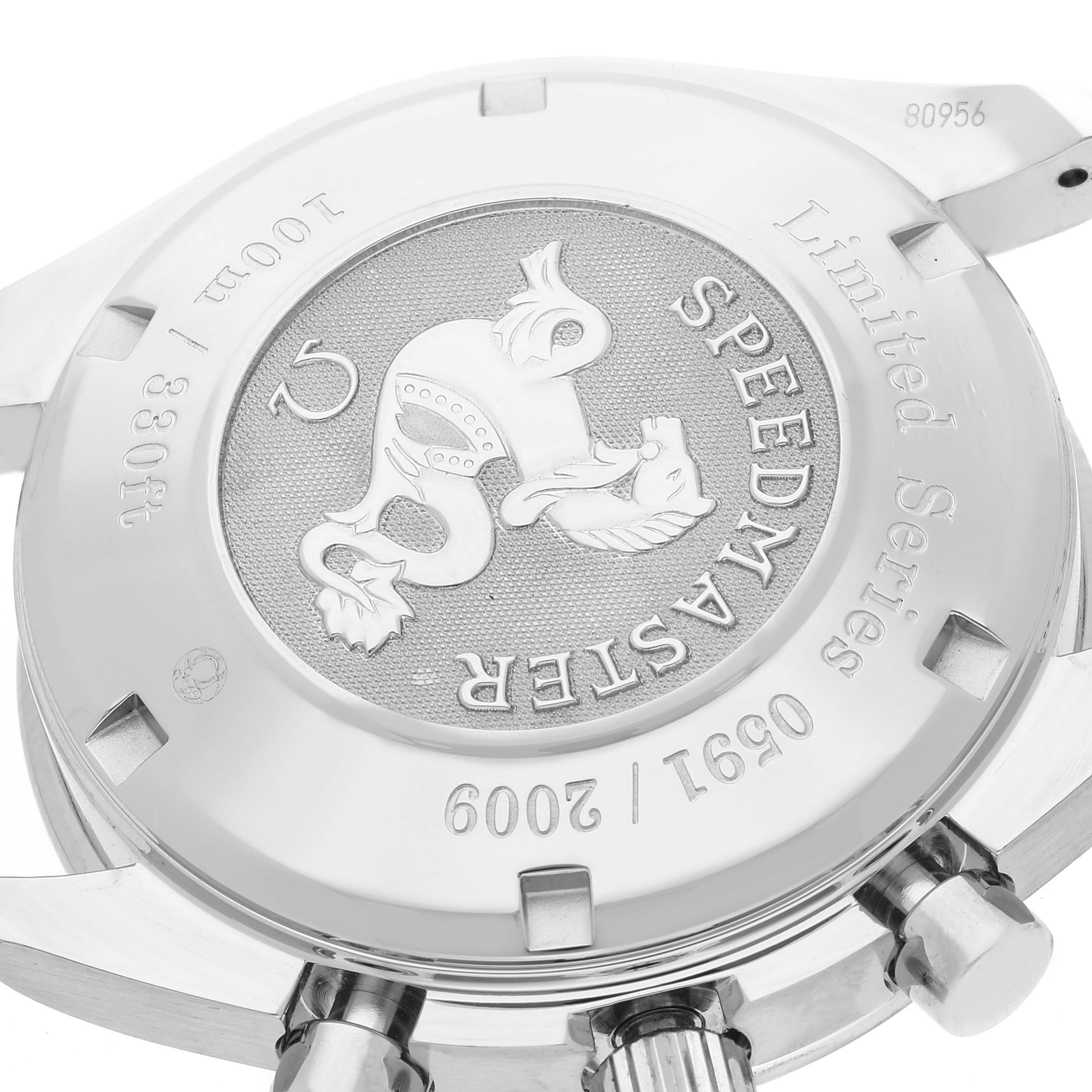 The image shows the back case of an Omega Speedmaster 323.30.40.40.02.001 Men's Stainless Steel White Dial 323.30.40.40.02.001 Men's Stainless Steel White Dial watch, highlighting the limited series engraving and model details.