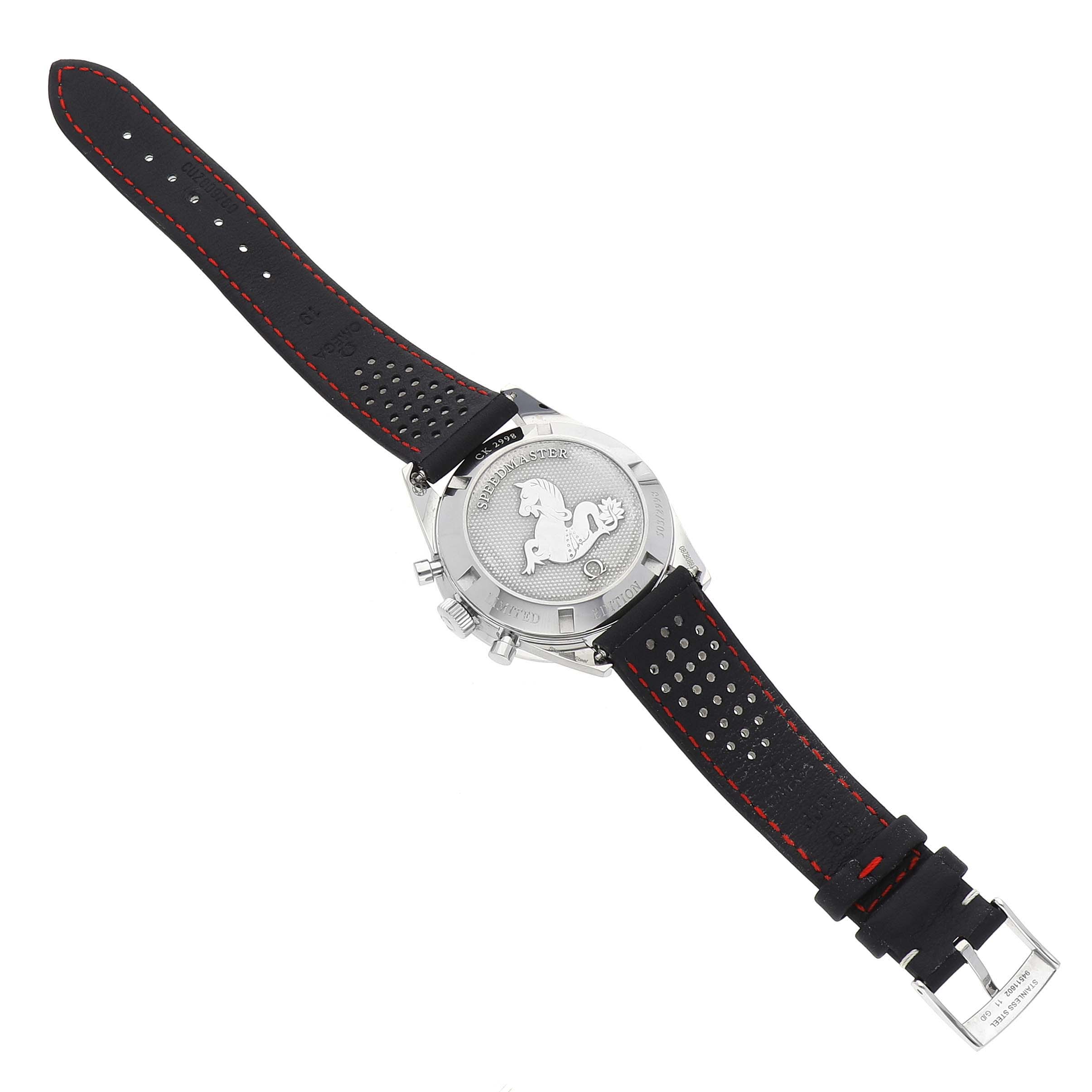 The image shows the back view of an Omega Speedmaster 311.32.40.30.02.001 Men's Stainless Steel Silver Dial, highlighting the case back and leather strap with red stitching.