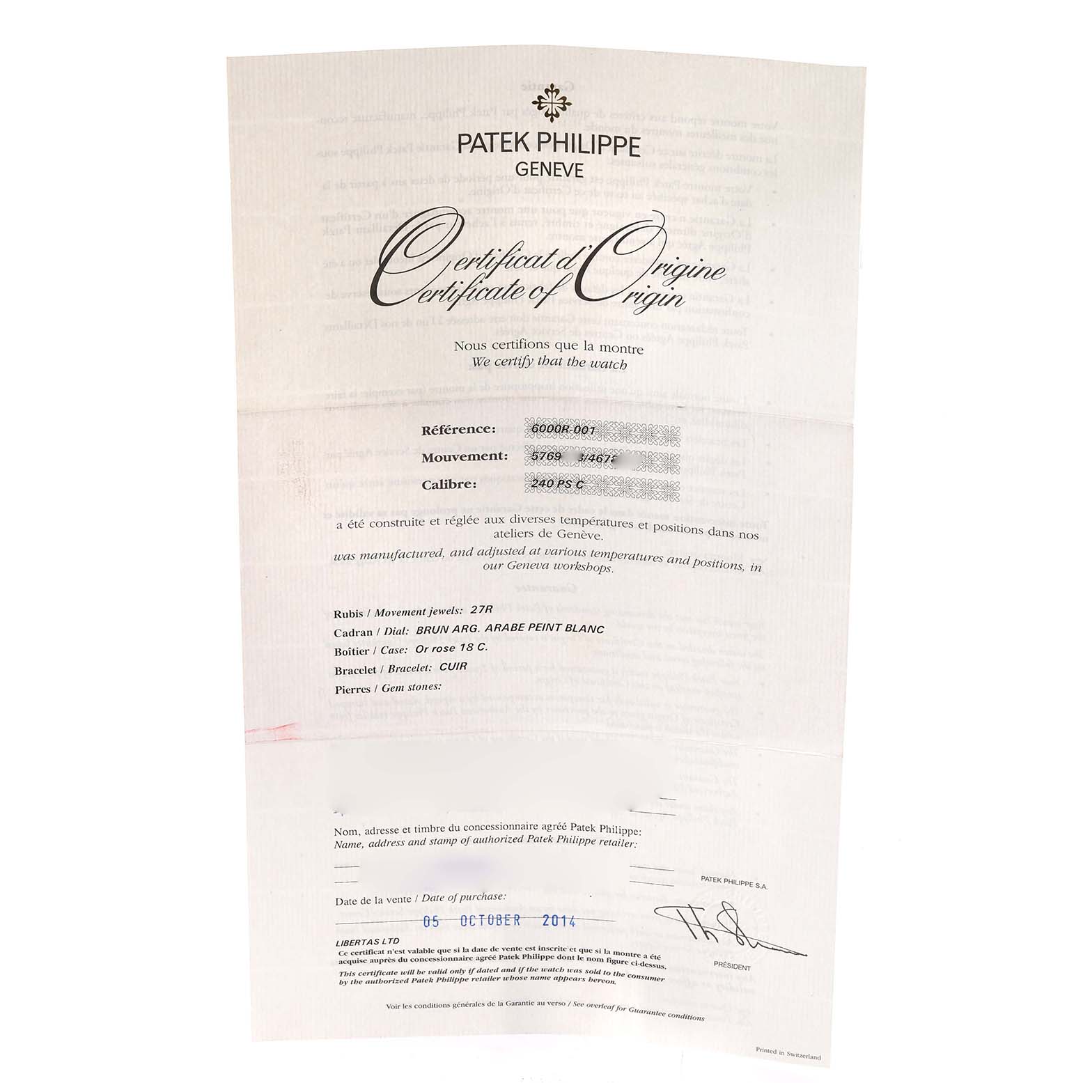 The image shows a Patek Philippe Certificate of Origin for the Calatrava model, including reference, movement, and caliber details.