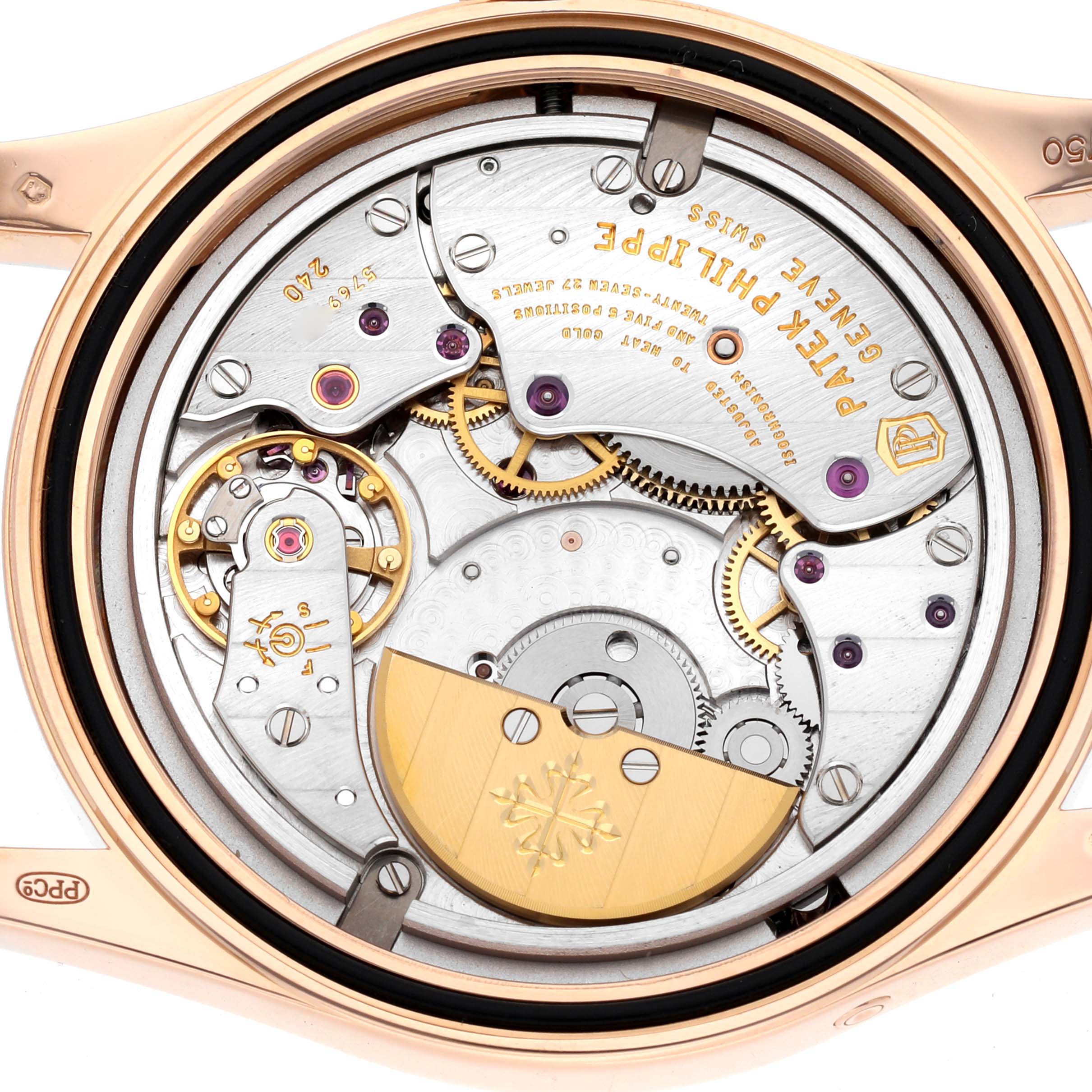The image shows a close-up view of the movement mechanism of a Patek Philippe Calatrava 6000R-001 Men's Rose Gold Brown Dial 6000R-001 Men's Rose Gold Brown Dial watch.
