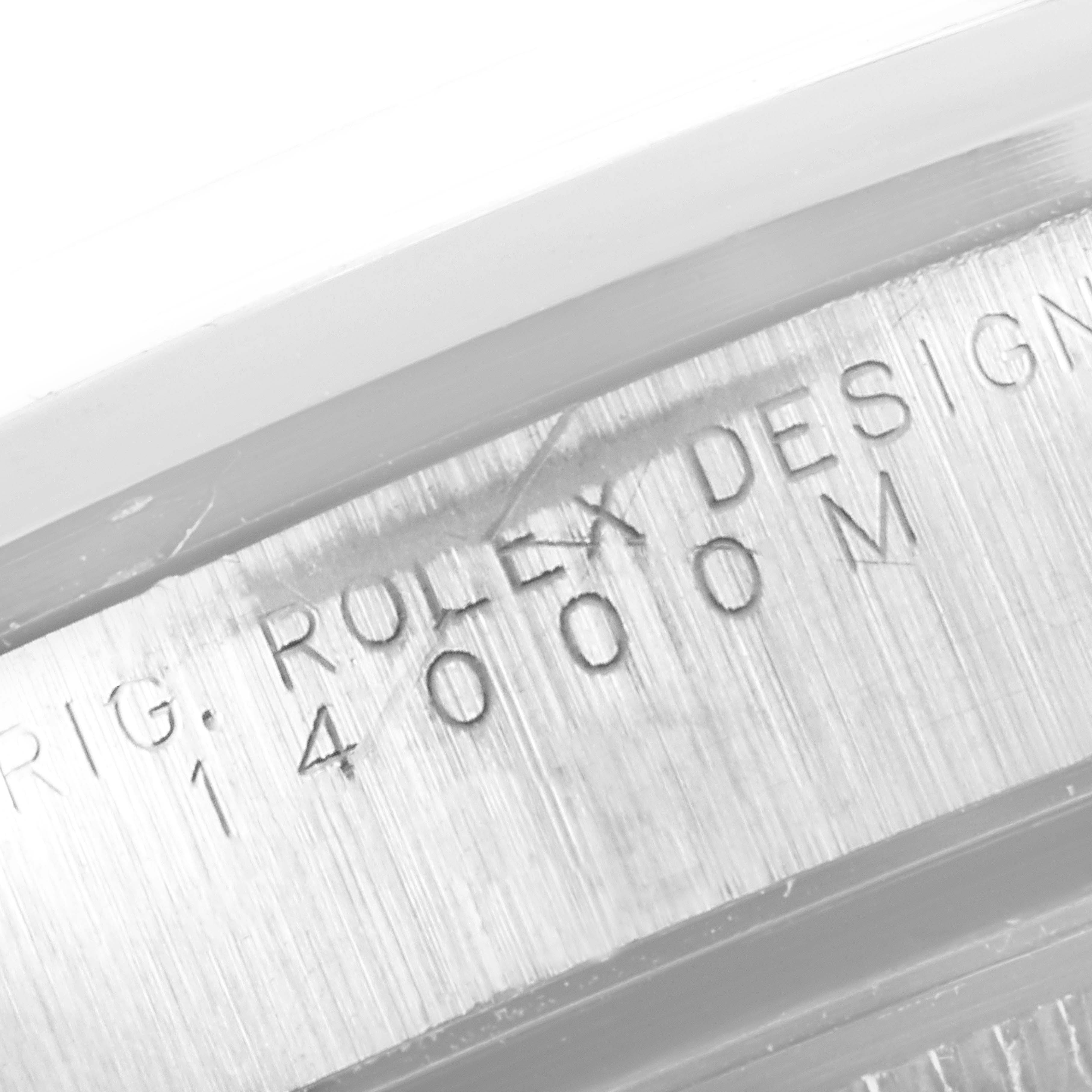 This is a close-up angle of a Rolex Air-King 14000 Men's Stainless Steel Black Dial 14000 Men's Stainless Steel Black Dial watch case, showing the model number 14000M and "ROLEX DESIGN" inscription.