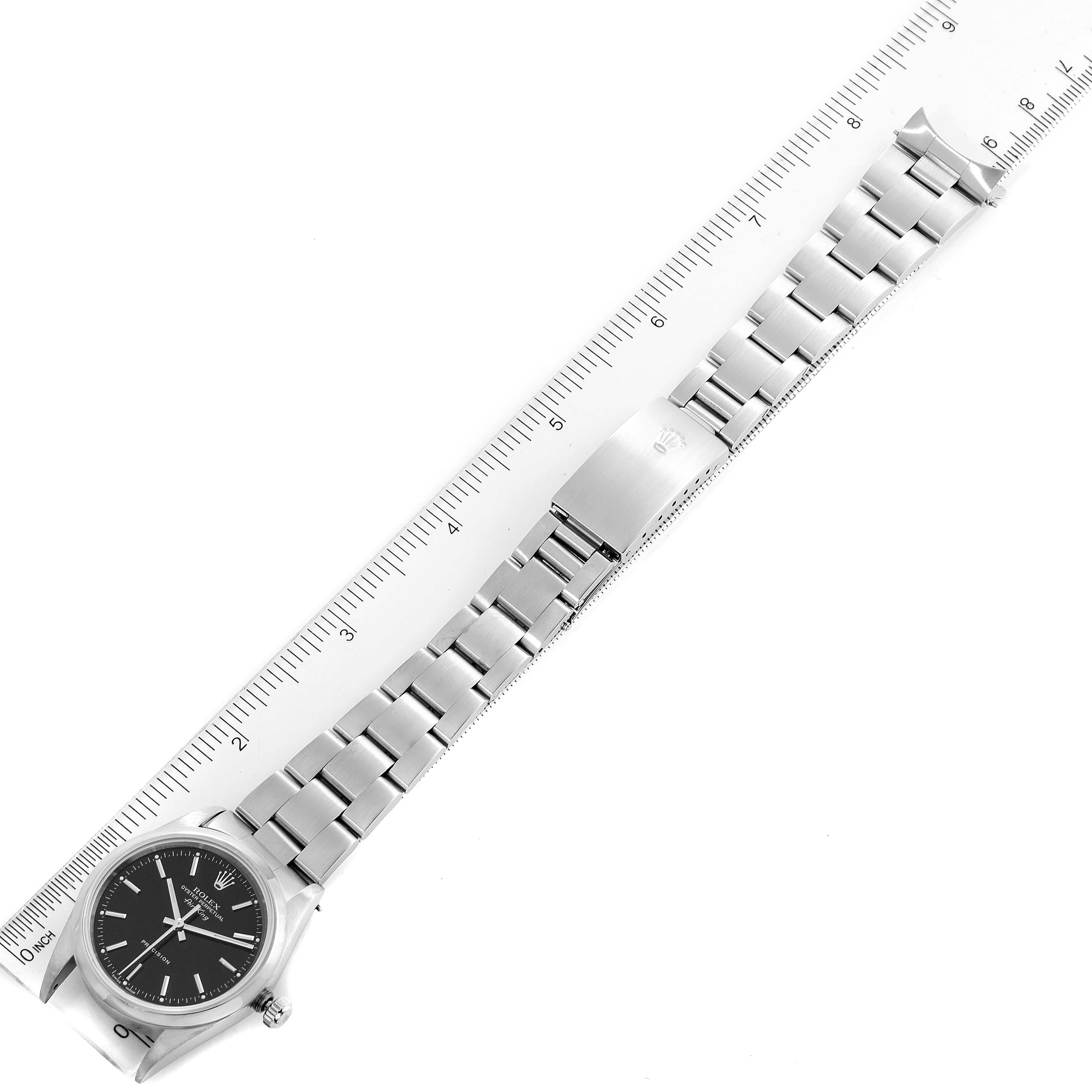 The image shows a Rolex Air-King 14000 Men's Stainless Steel Black Dial 14000 Men's Stainless Steel Black Dial watch laid flat with its bracelet extended, next to a ruler for scale.