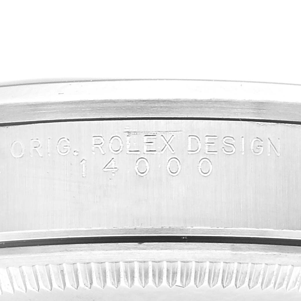 The image shows a close-up of the serial number engraving on the side of a Rolex Air-King 14000 Men's Stainless Steel Blue Dial 14000 Men's Stainless Steel Blue Dial watch casing.