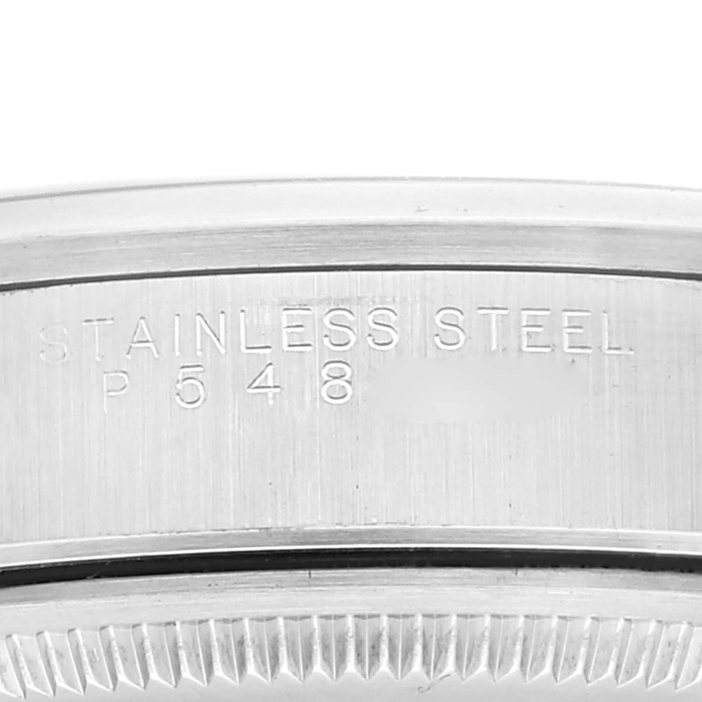 The image shows a close-up of the engraving on the stainless steel bezel of a Rolex Air-King 14000 Men's Stainless Steel Blue Dial 14000 Men's Stainless Steel Blue Dial watch.