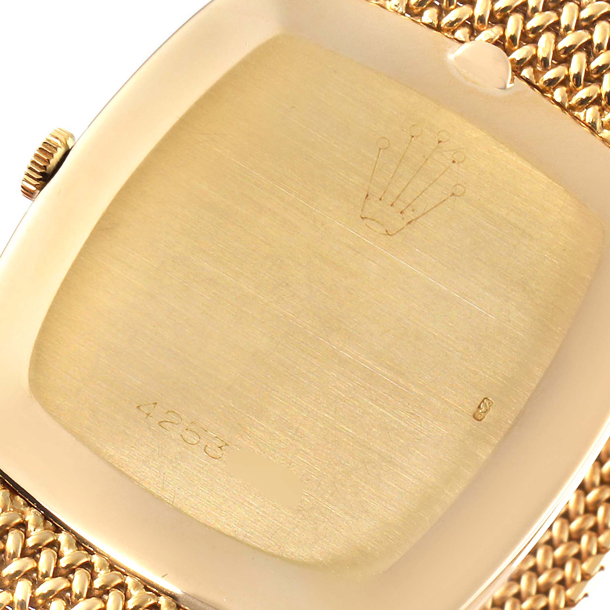 The image shows the back case of a Rolex Cellini 4086 Men's Yellow Gold Champagne Dial 4086 Men's Yellow Gold Champagne Dial watch, highlighting the watch crown and case markings.