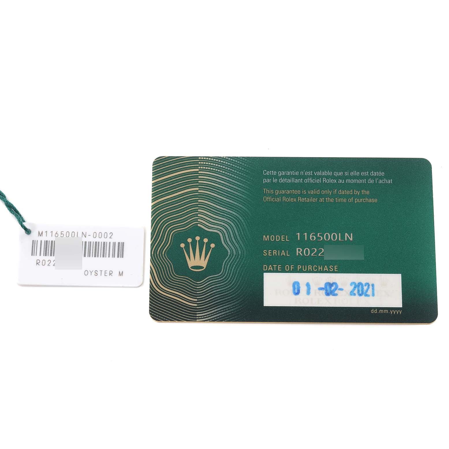 This image shows the warranty card and tag for a Rolex Daytona 116500 Men's Stainless Steel Black Dial 116500 Men's Stainless Steel Black Dial model 116500LN.