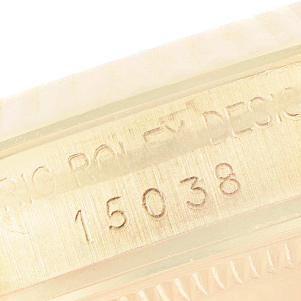 This image shows a close-up of the engraved serial number on a Vintage Collection Rolex watch case.